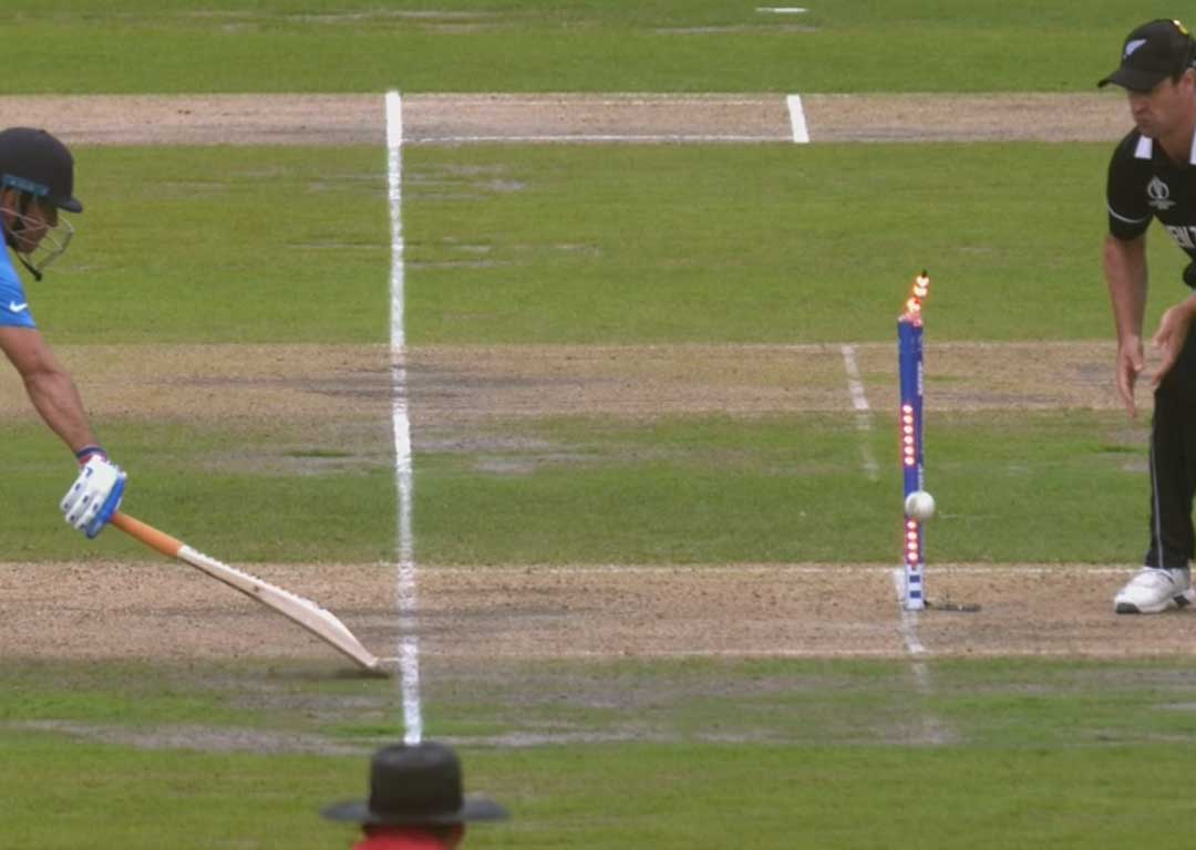 MS Dhoni is run out by Martin Guptill. Photo / Sky Sport