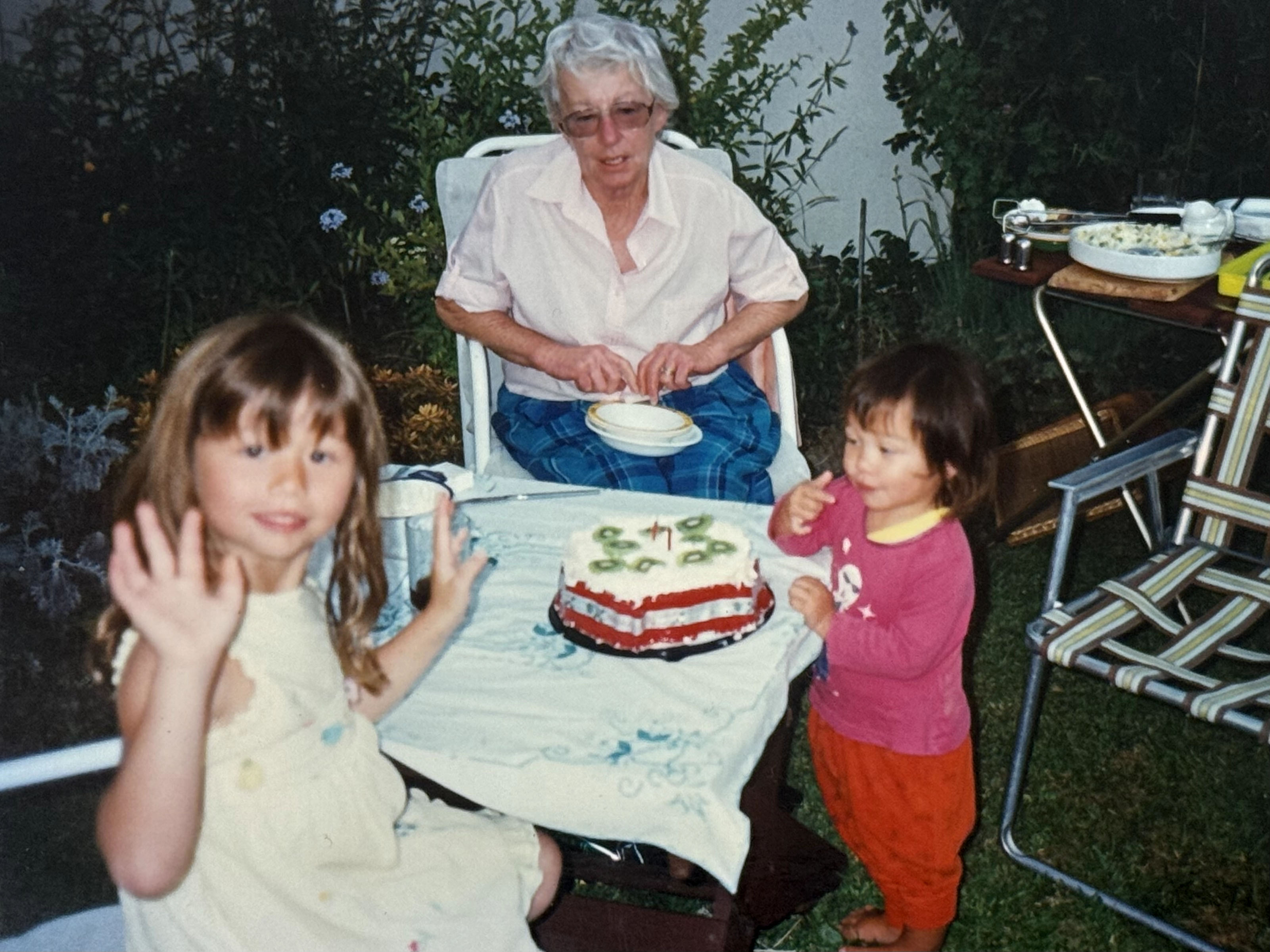 Two-year-old Victoria (right) with her grandma (middle) and sister (left).