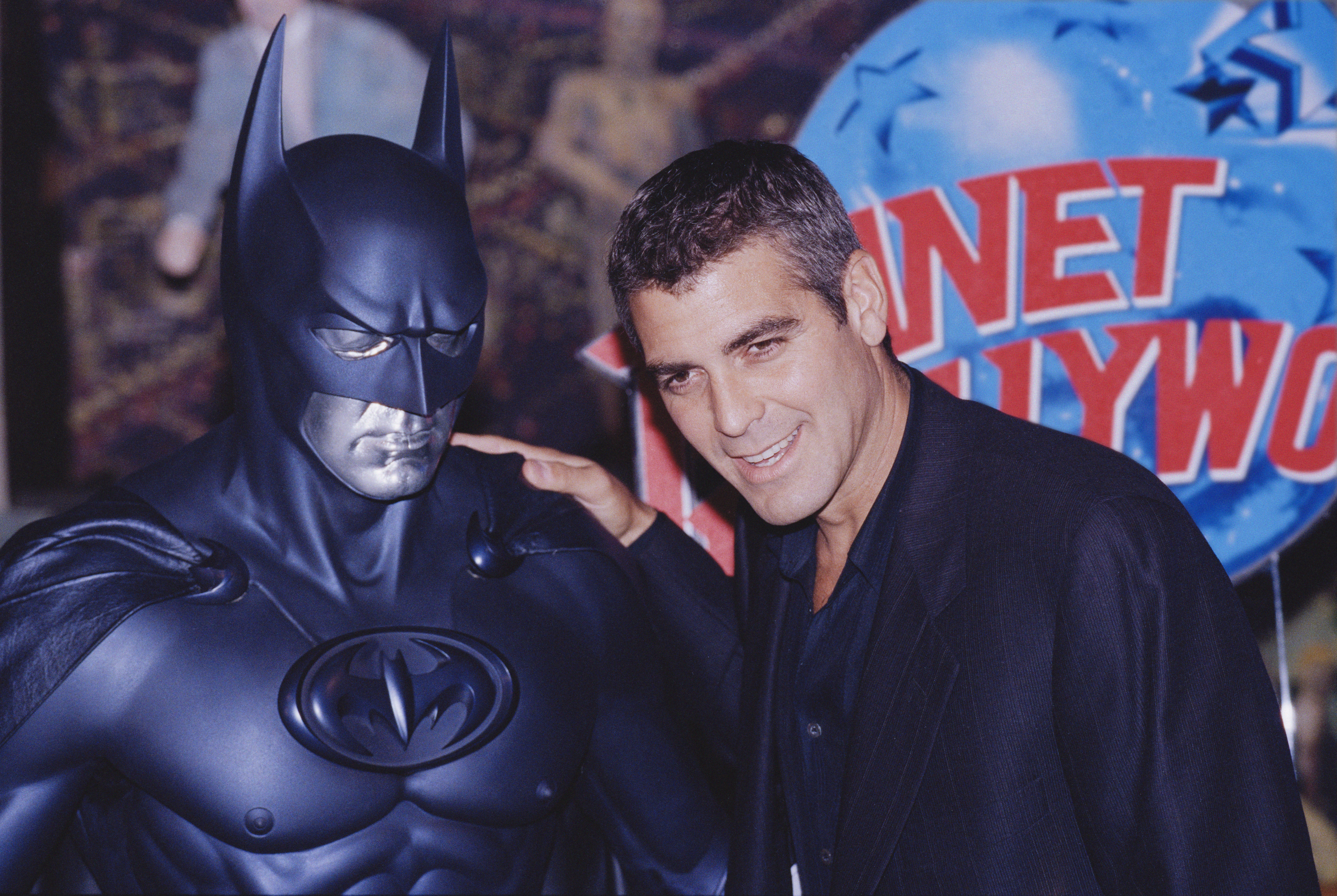American actor George Clooney poses with a model of Batman during a photocall for his film 'Batman and Robin' in 1997. Photo / Getty