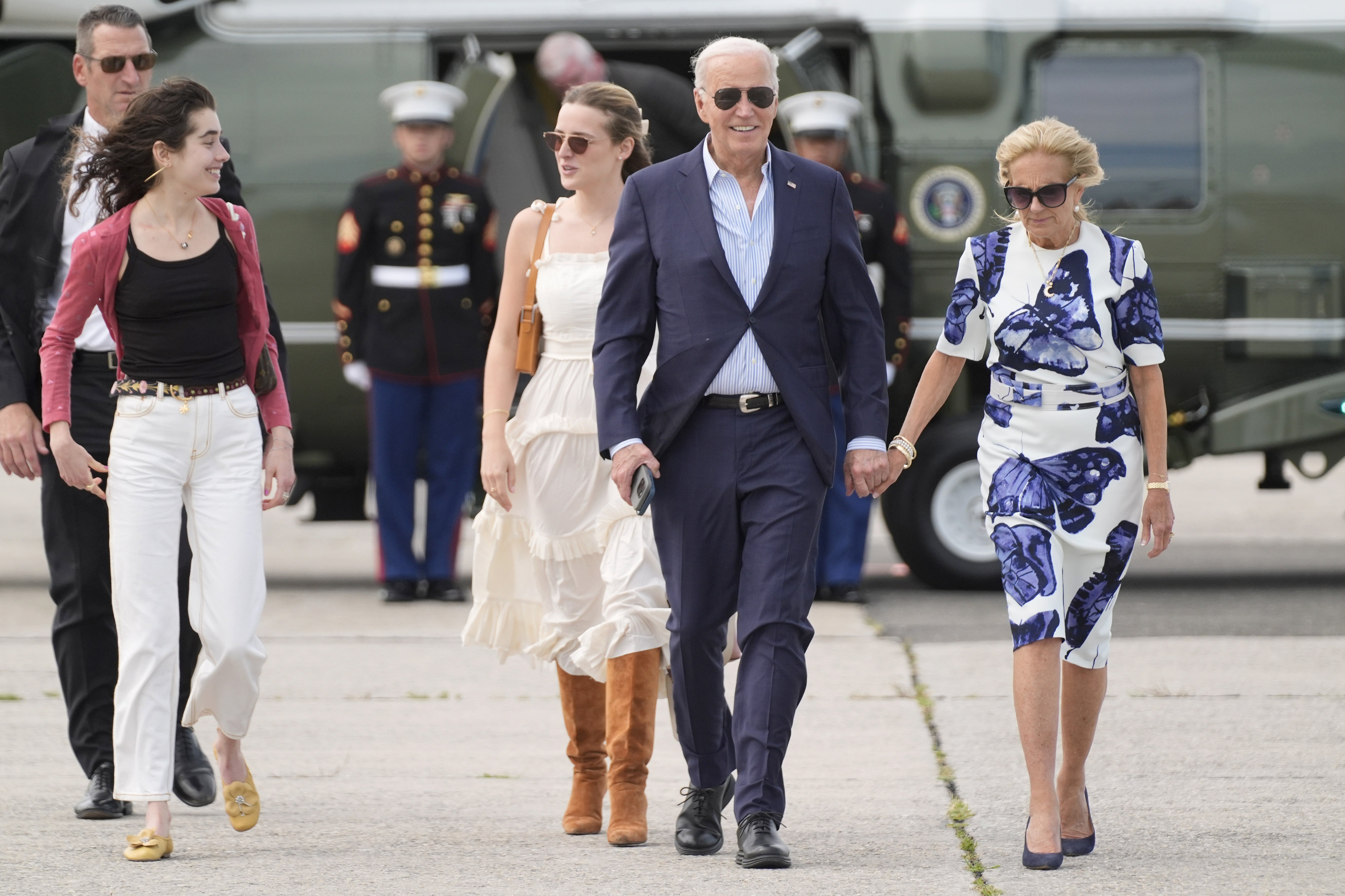 US President Joe Biden (centre right) and First Lady Jill Biden (right) arrive on Marine One with granddaughters Natalie Biden (left) and Finnegan Biden (centre left) at East Hampton Airport, New York. Photo / AP
