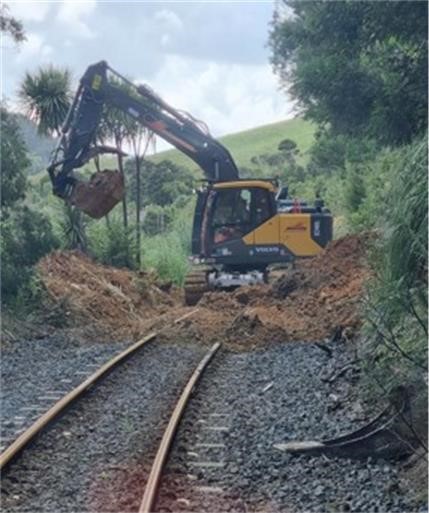 A slip on the line to Northland being cleared. Photo / KiwiRail