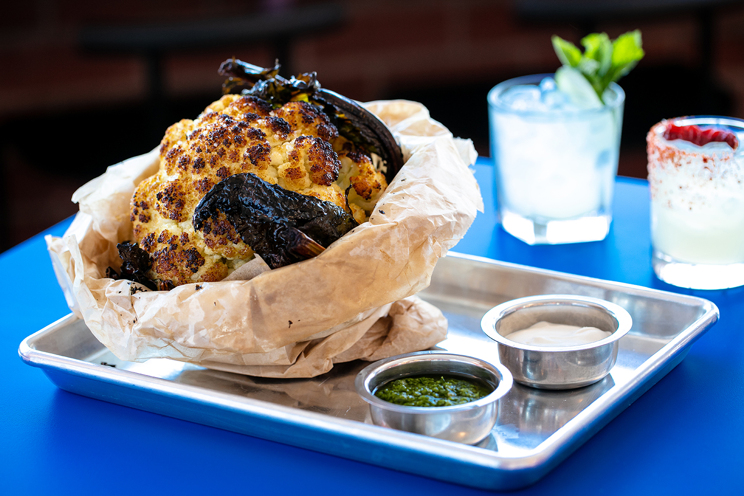 The cauliflower comes charred and whole. Photo / Babiche Martens