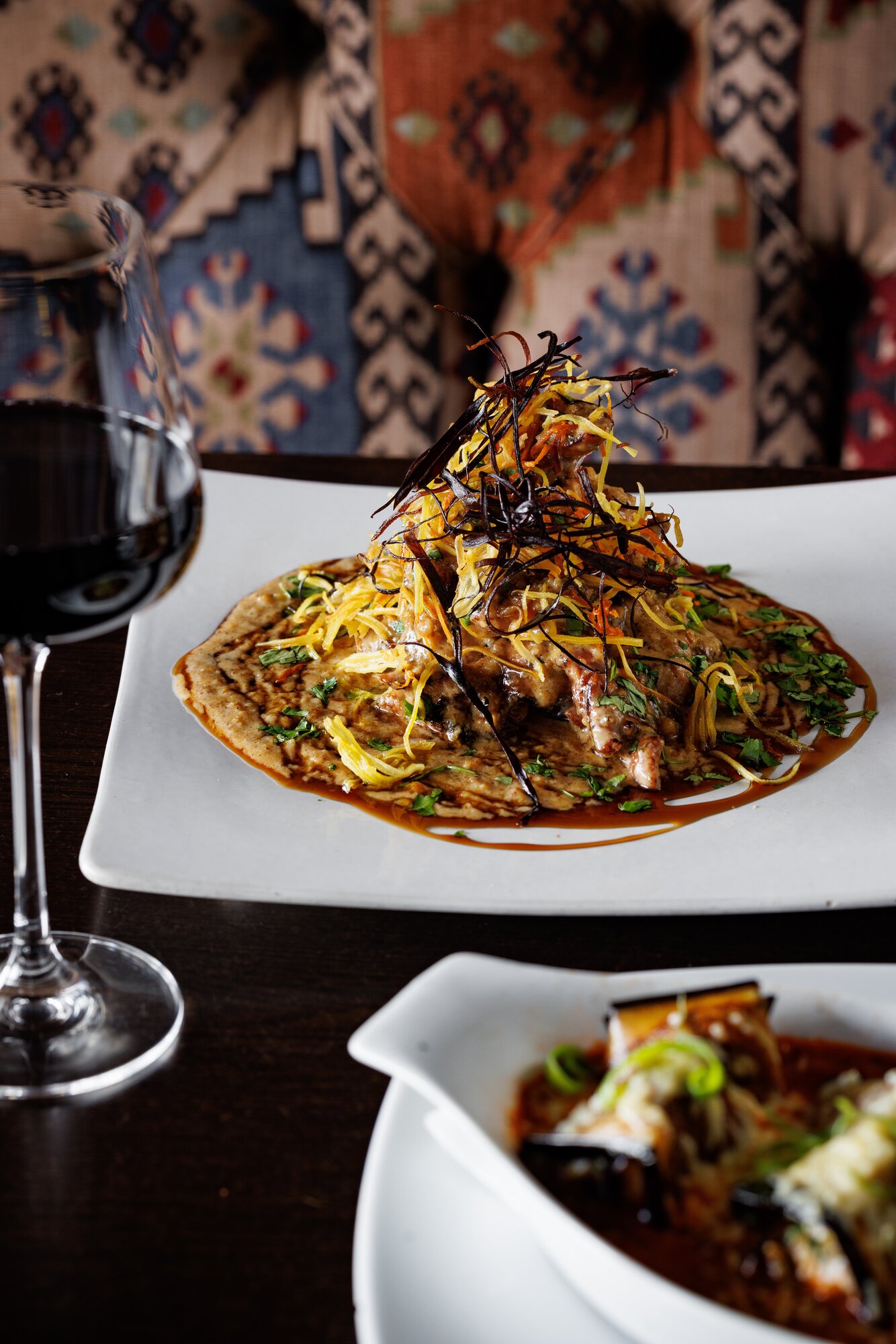 Georgian chicken served with lashings of walnut sauce and pomegranate molasses. Photo / Babiche Martens