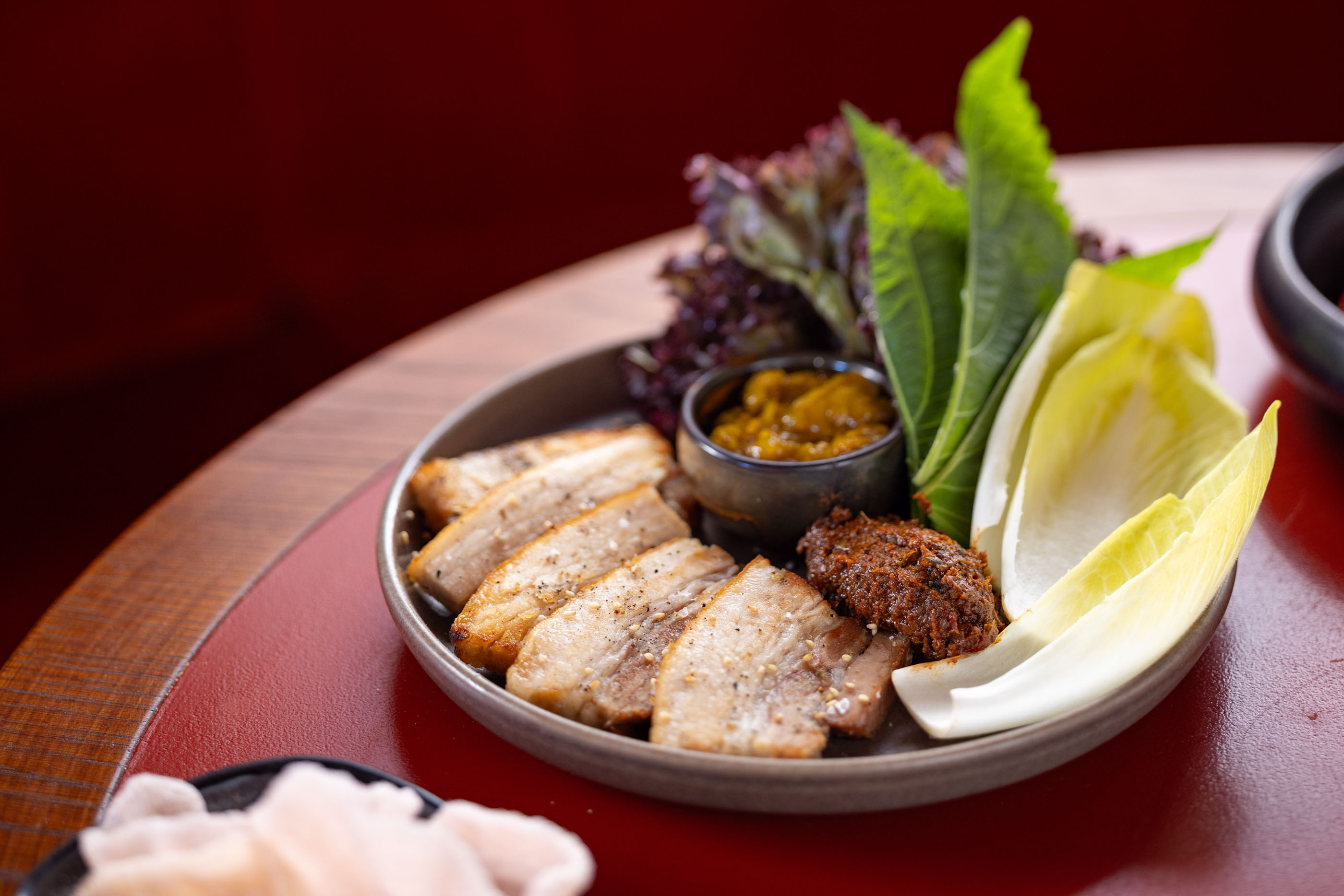 The barbecue pork platter with doenjang. Photo / Babiche Martens