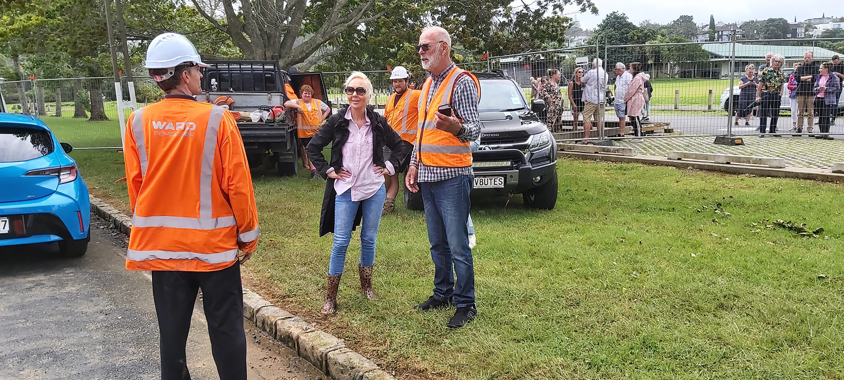 Desley Simpson with mayor Wayne Brown on Shore Rd after a slip hit a house, killing resident David Lennard. Photo / Supplied