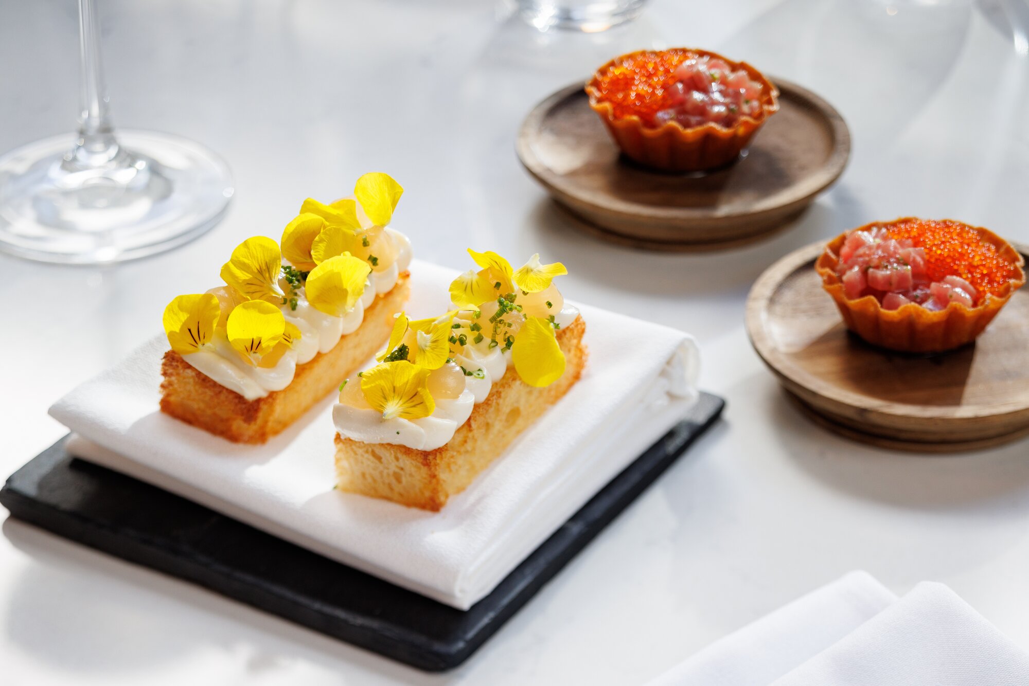 The taramasalata and tuna tartlette snacks on the menu at The Grill restaurant in the Horizon Hotel. Photo / Babiche Martens