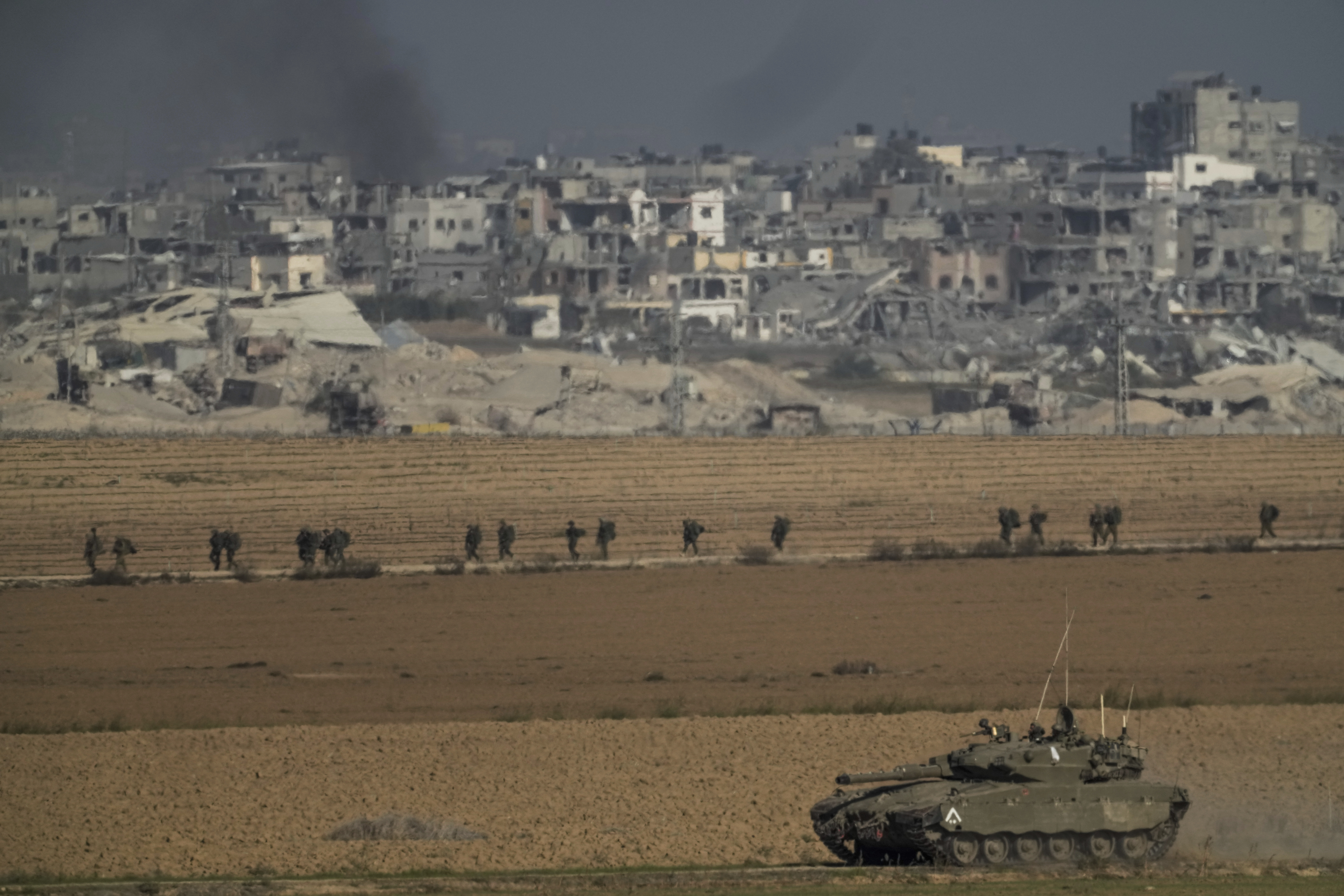 Israeli troops are seen near the Gaza Strip border, in southern Israel. Photo / AP