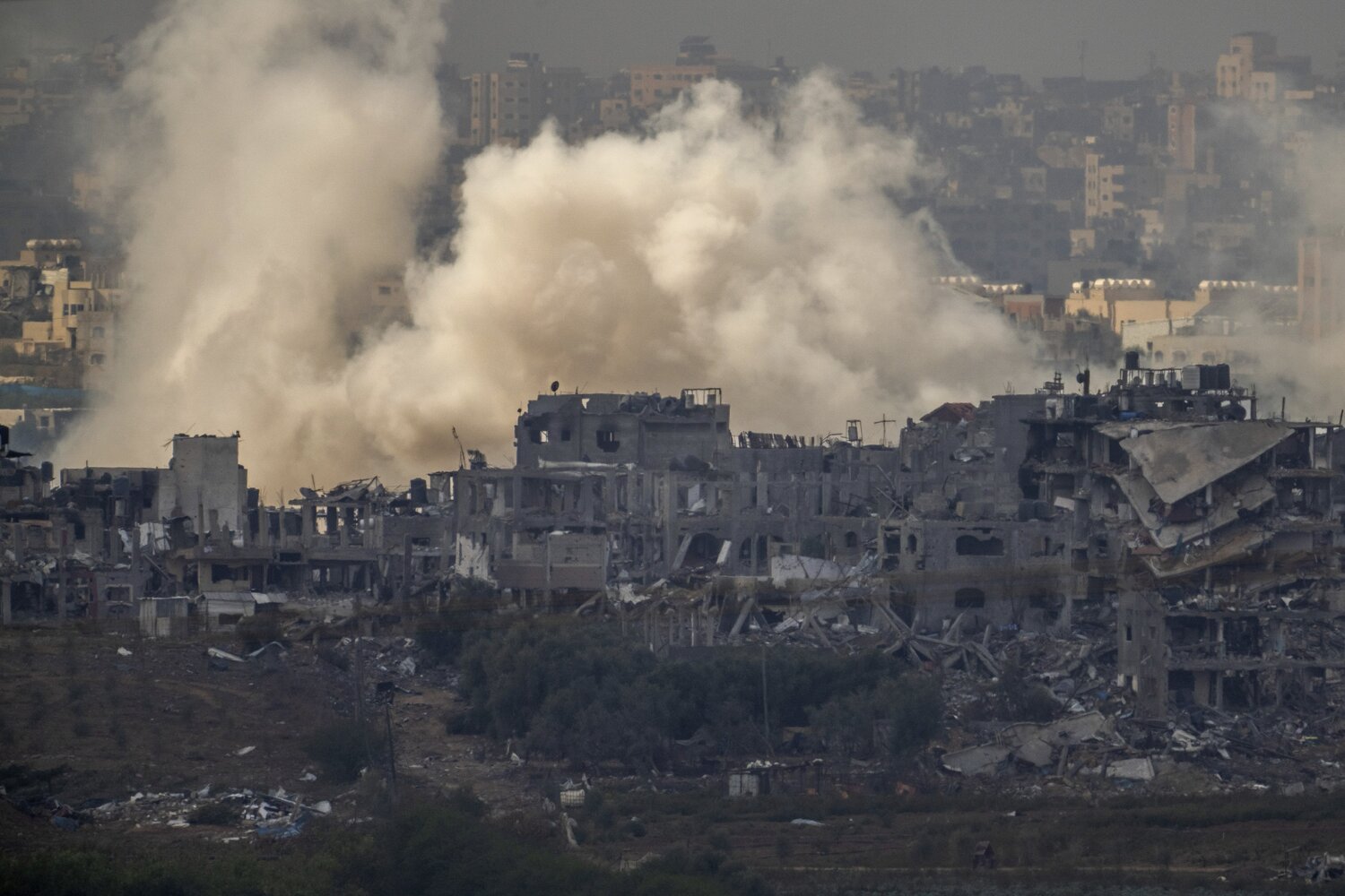 Smoke rises from an explosion in the Gaza Strip as seen from southern Israel, November 14. Photo / AP  