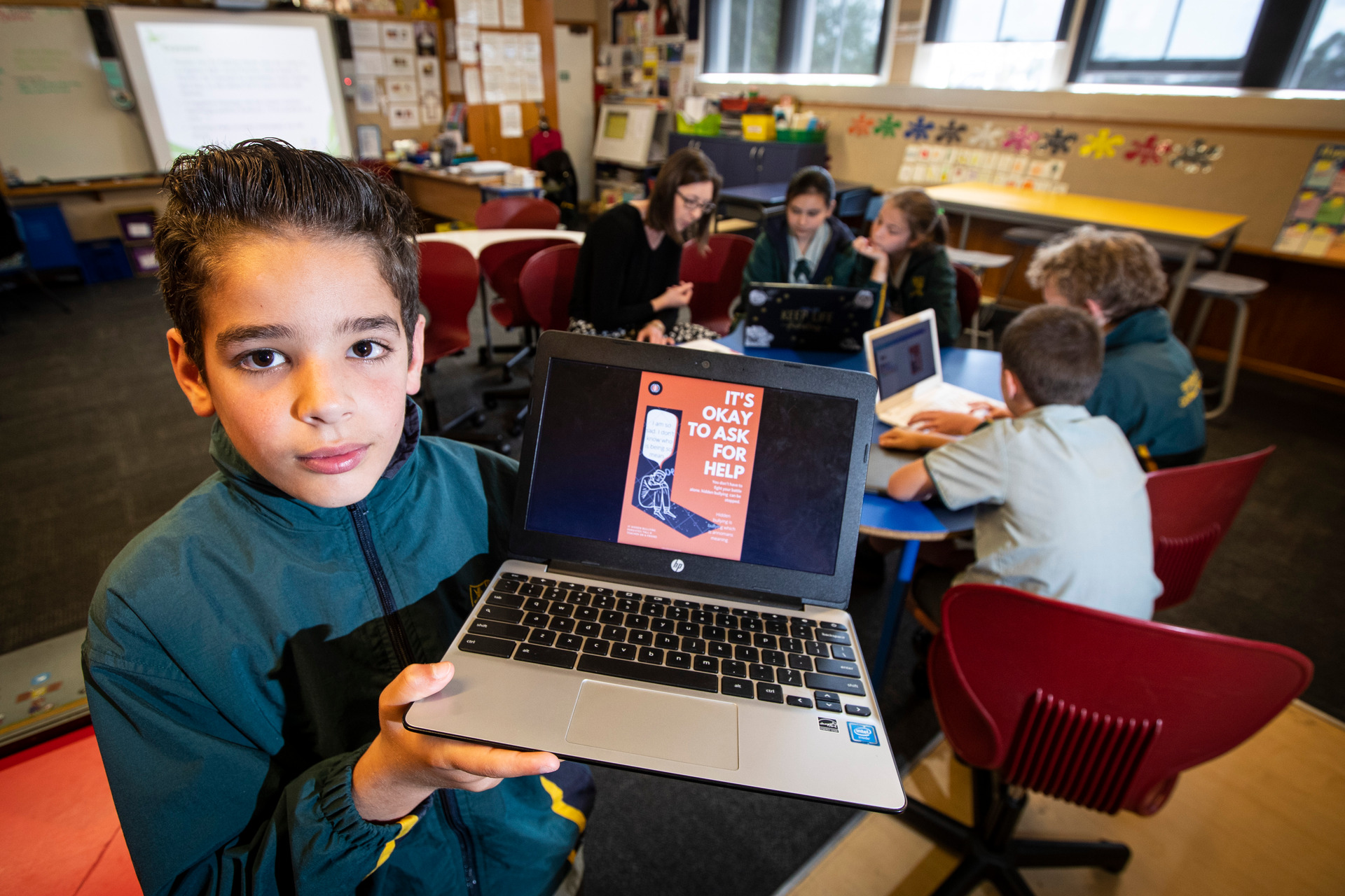 Stavro Purdie, 10, says the bullying against him ended after a KiVa programme was put in place; Meng Foon says all schools should have to adopt similar programmes. Photo / Jason Oxenham