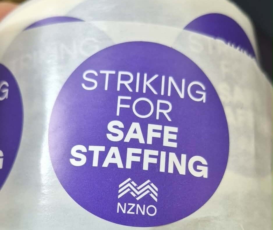 The NZNO union stickers are banned because they might spread infection or come loose during procedures.