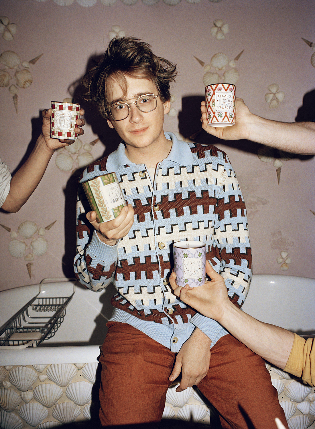 Luke Edward Hall with candles from his Ginori 1735 Profumi Luchino collection. Photo / Supplied