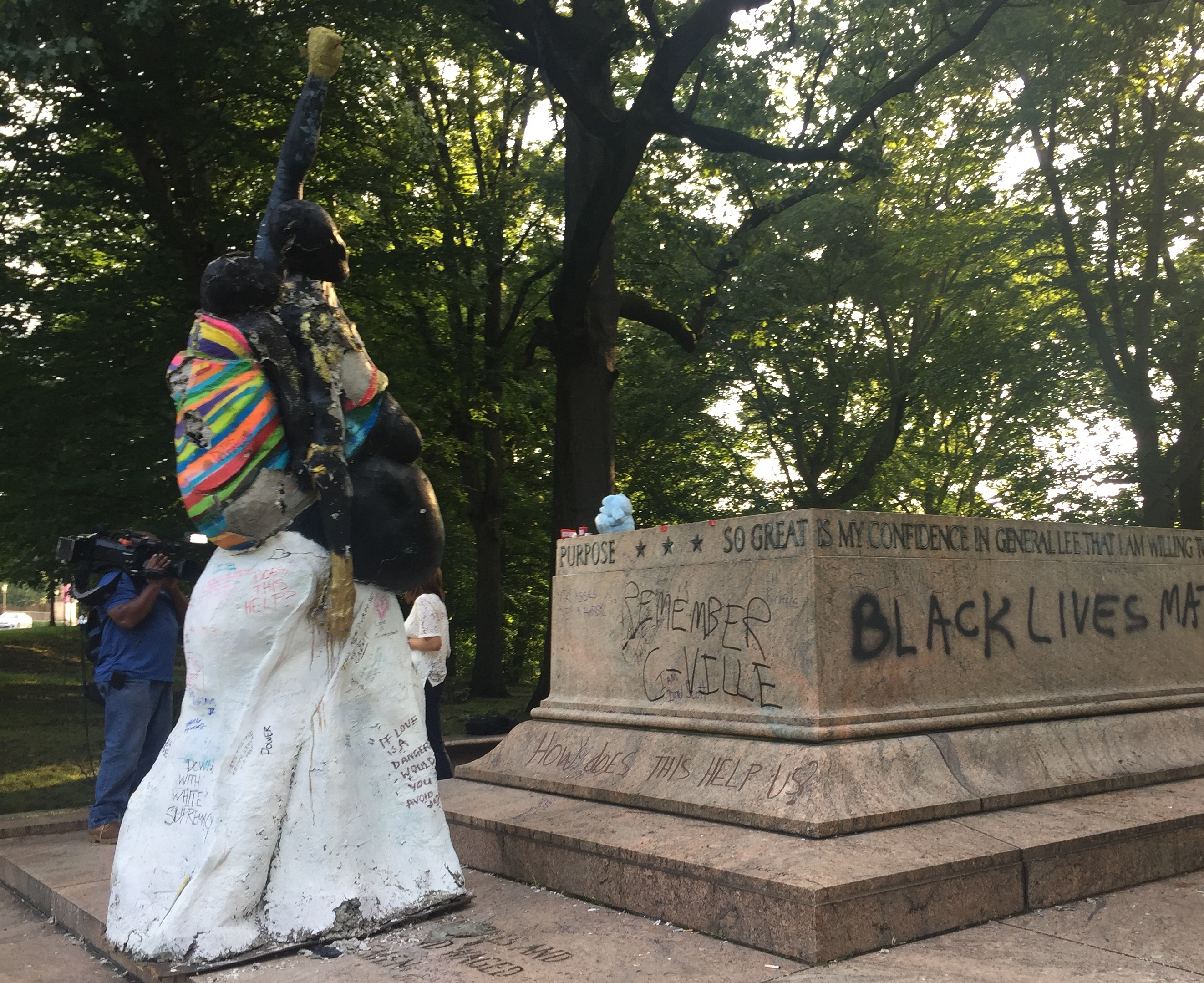 Light shines through the trees near where a Confederate statue stood in Baltimore. Four statues, including the one pictured, in Baltimore were removed under the cover of night. Photo / AP
