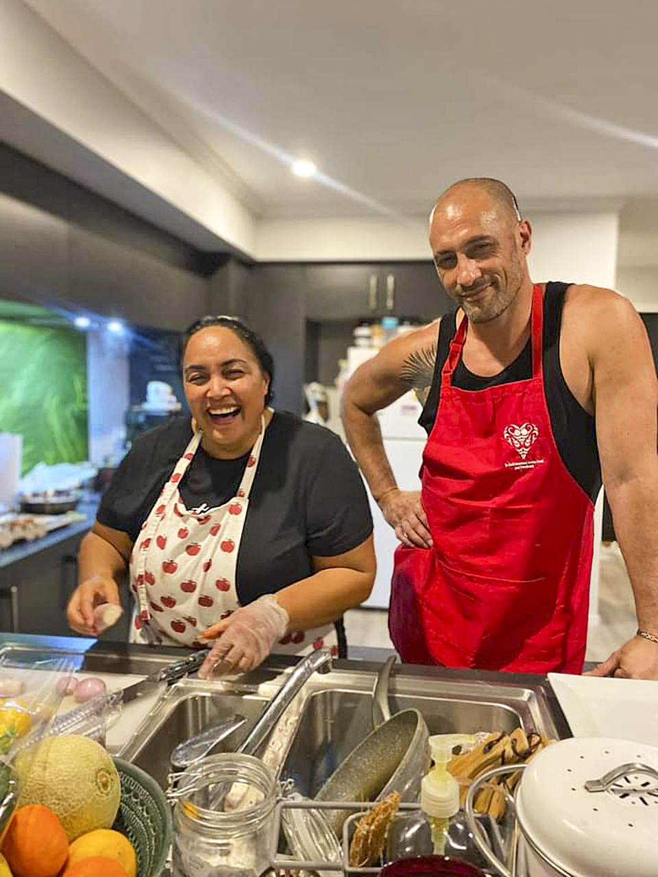 Piki and Michael cooking for their whanau at home in Hamilton. Photo / Woman's Day