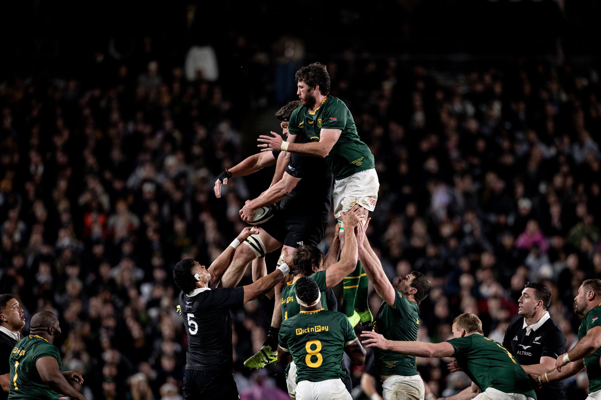 Springboks lock Ruan Nortje challenges Scott Barrett for possession at Eden Park. Photo / Dean Purcell