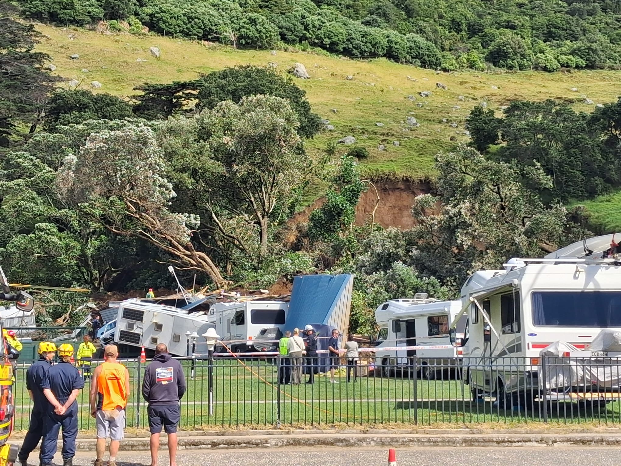 Emergency services at the scene of the Mount Maunganui landslide. Photo / Alister McHardy