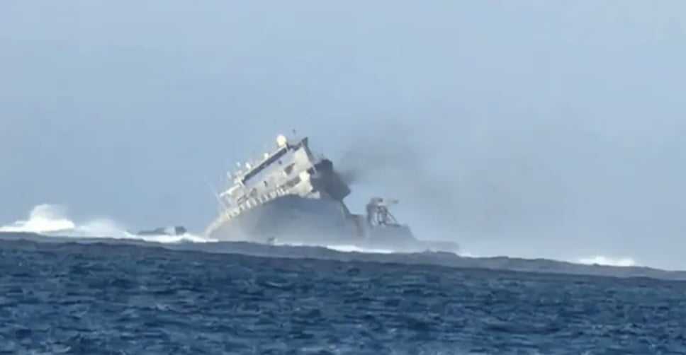 The stricken HMNZS Manawanui with smoke coming from it. Photo / Profile Boats