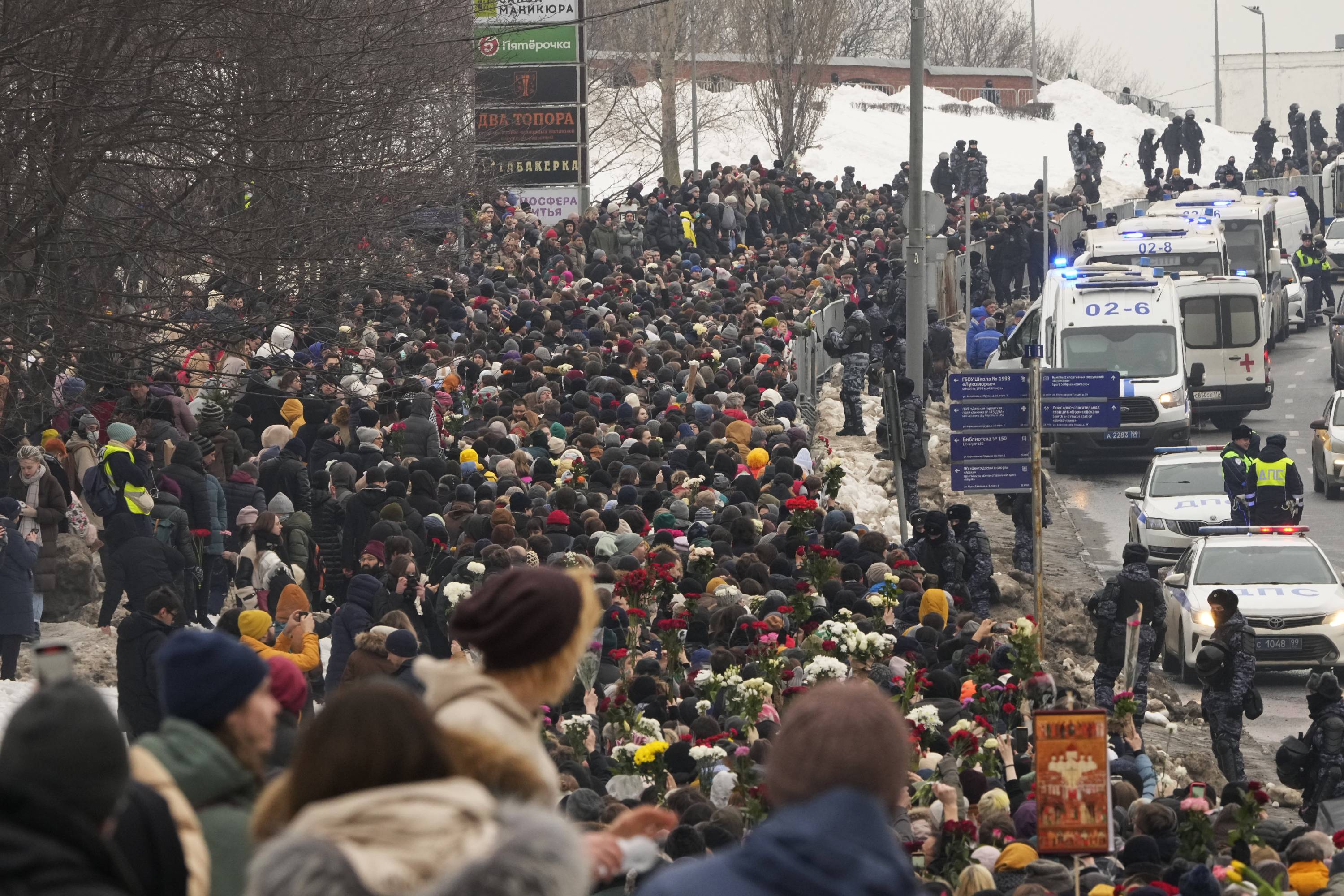 Police kept a close watch as mourners walked towards the Borisovskoye Cemetery near Moscow for the funeral of Russian opposition leader Alexei Navalny. Photo / AP
