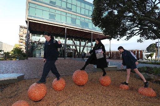 Haylee Molencelli, 11, Creative Northland  manager Olivia Garelja and Leela Harding, 12, enjoy the newly landscaped Civic Centre. Photo / Michael Cunningham