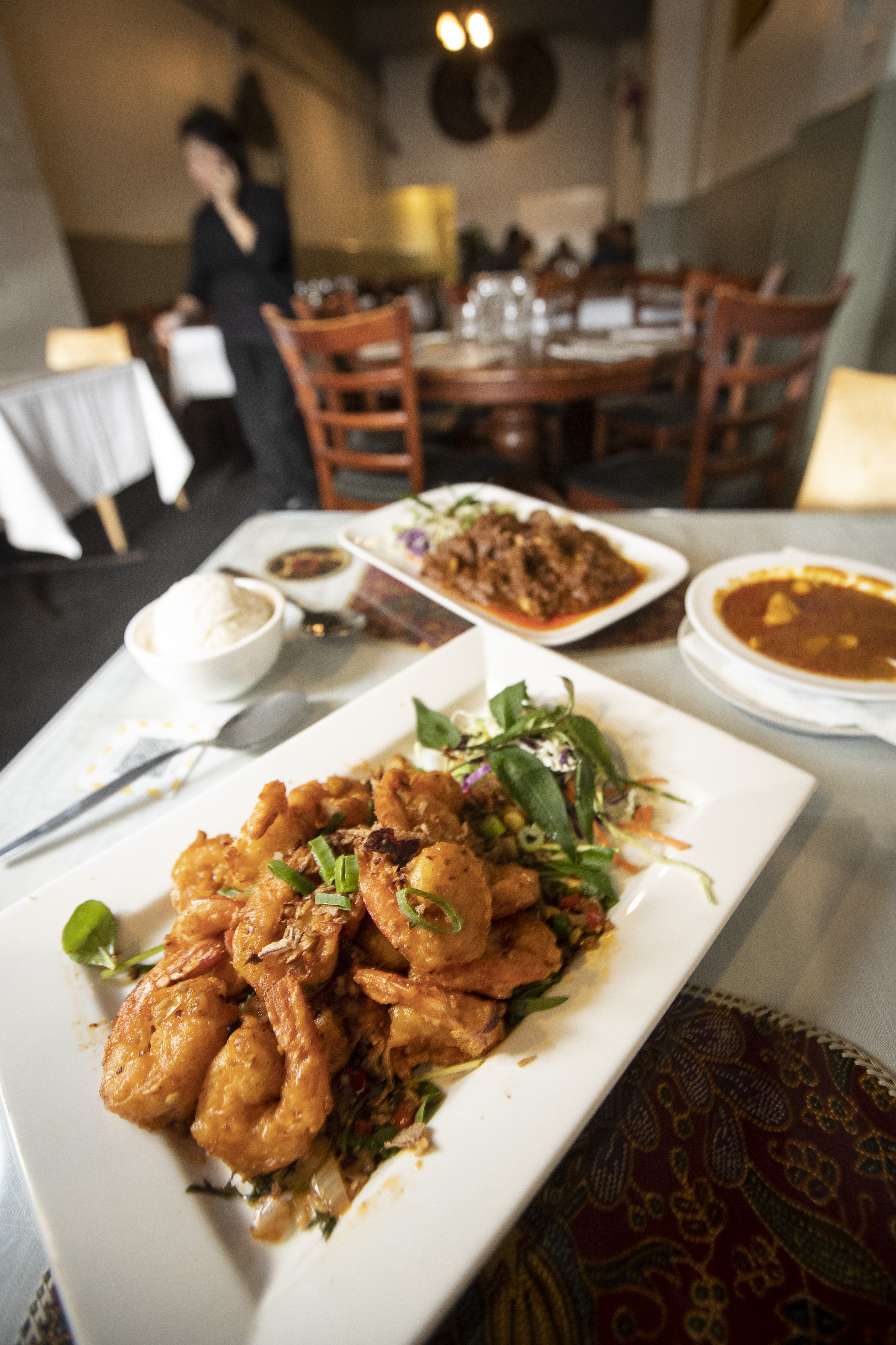 The garlic prawns, roti curry and beef rendang at Sri Pinang. Photo / Jason Oxenham