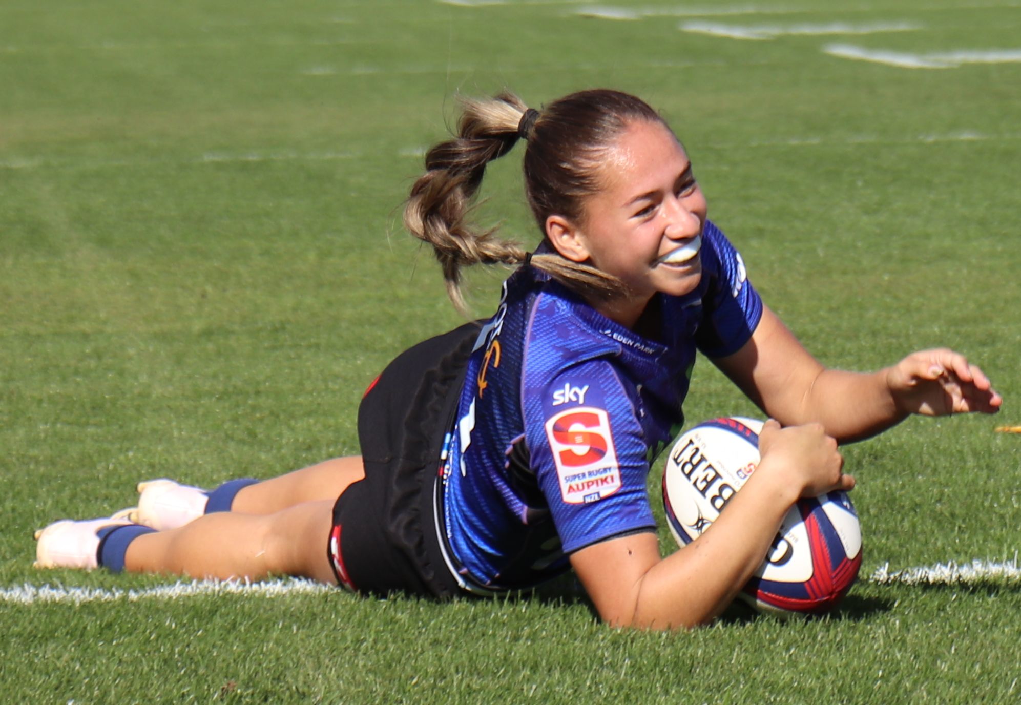 Blues winger Jaymie Kolose is all smiles after scoring a late try against Hurricanes Poua at Levin Domain.