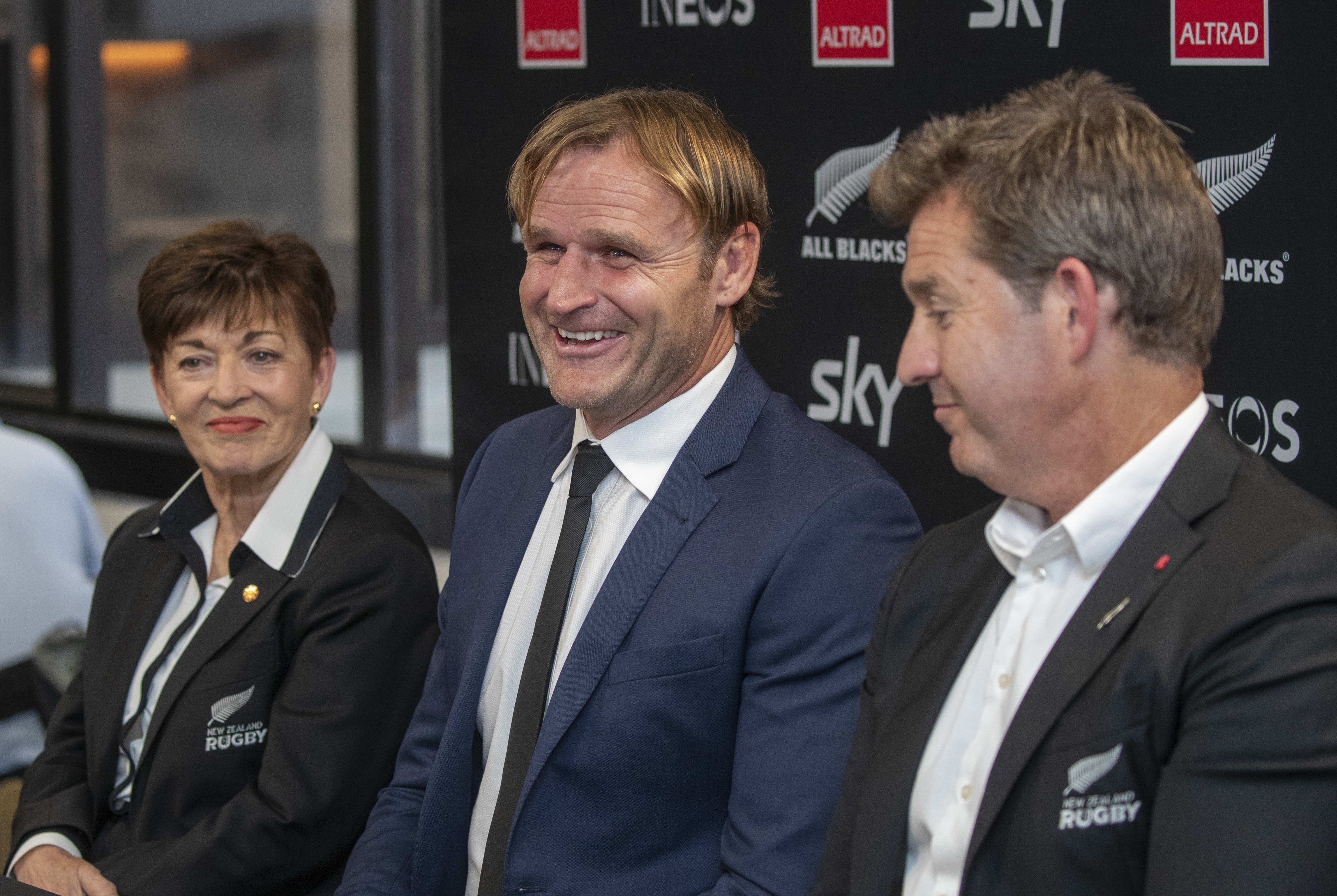 New Zealand Rugby chair Dame Patsy Reddy (from left), Scott Robertson and NZR CEO Mark Robinson speak to the media. Photo / Mark Mitchell