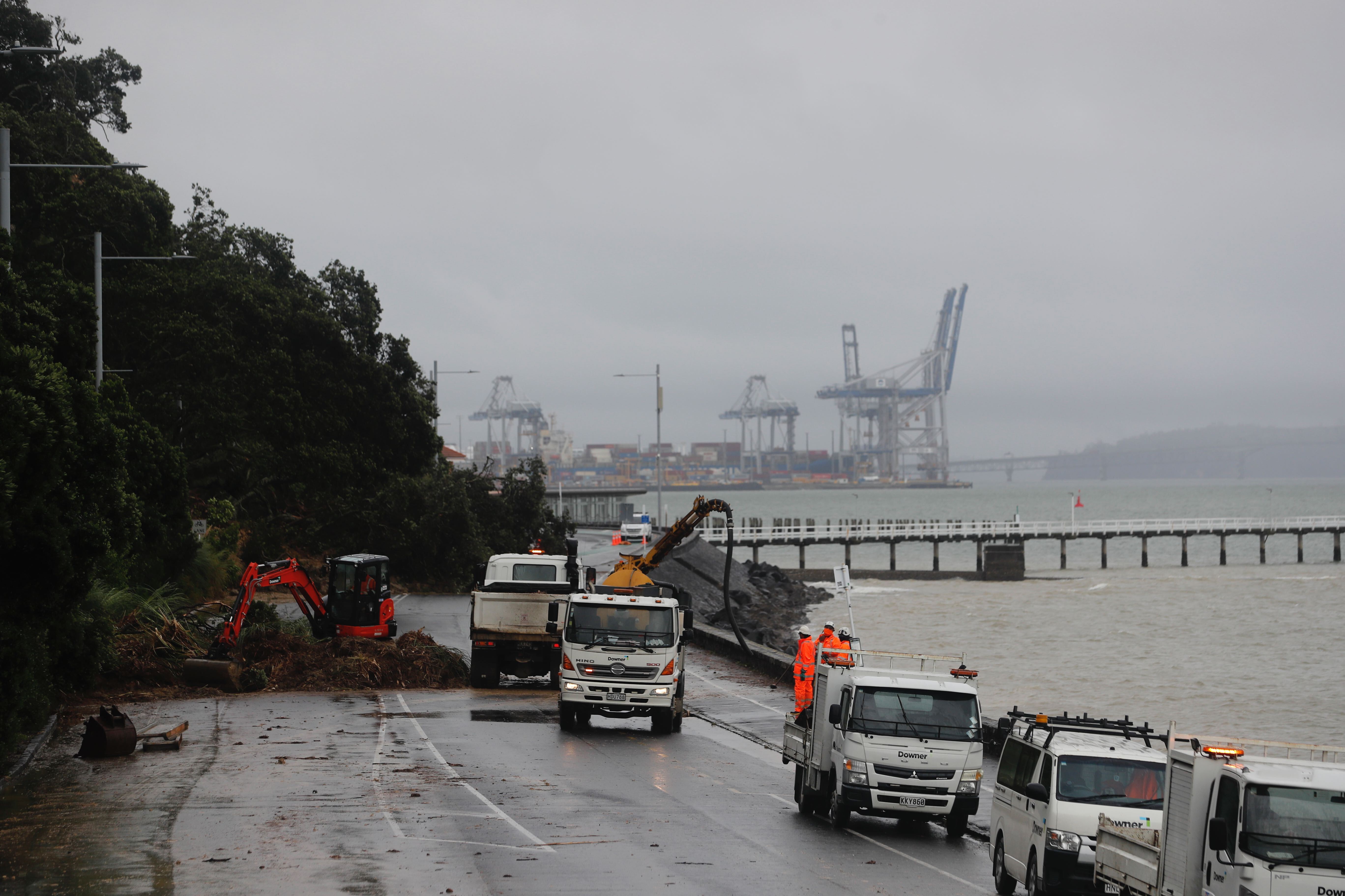 Workers are clearing a large slip on Tamaki Dr between Okahu Bay and Mission Bay. Photo / Dean Purcell