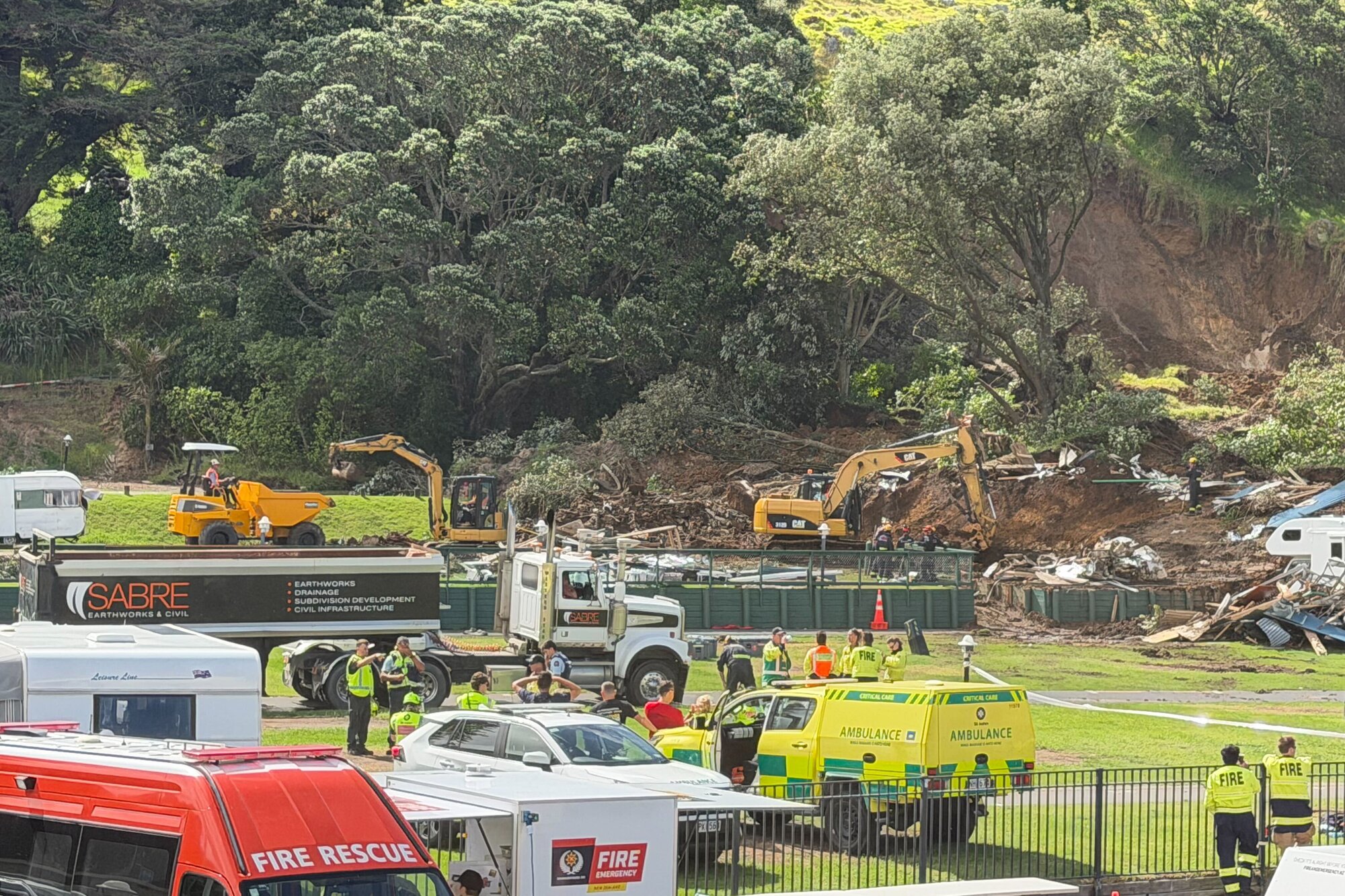 Rescue efforts are continuing at the Mount Maunganui campground after the landslide.