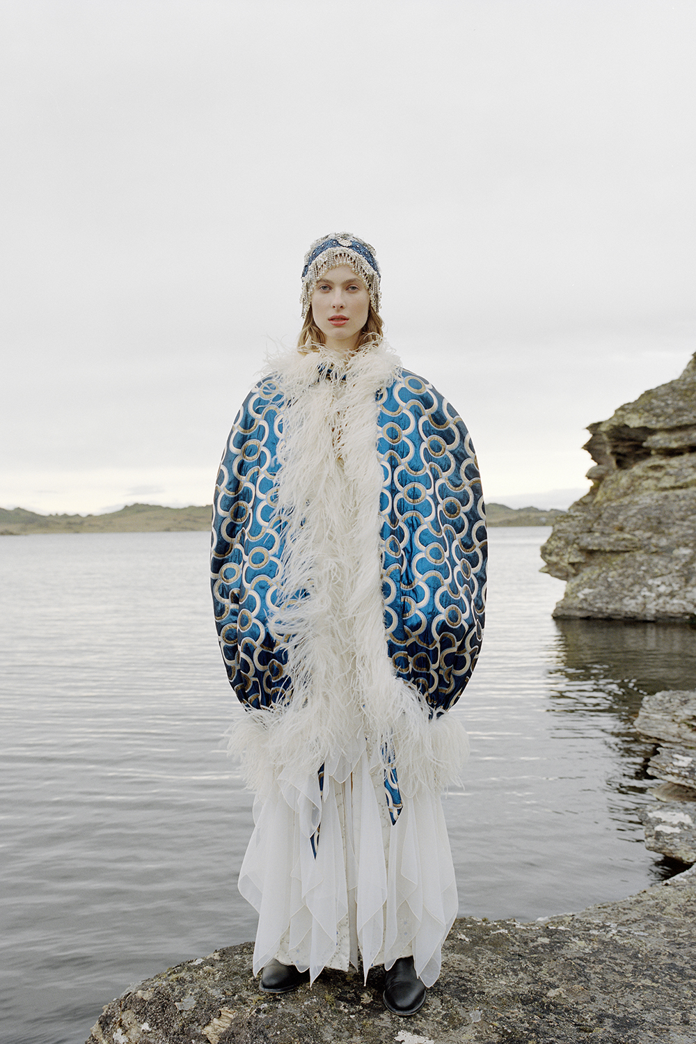 Evening dress, cape and cap by Vinka Lucas, photographed by Derek Henderson at the Poolburn Dam, Central Otago