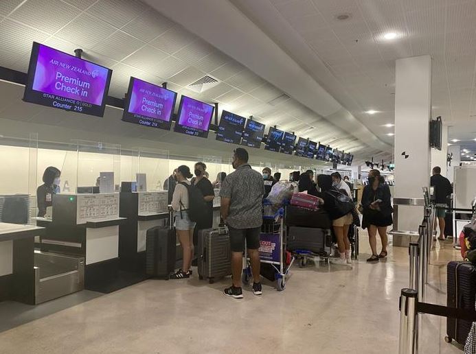Passengers head off to the Cook islands after the travel bubble reopened. Photo / RNZ