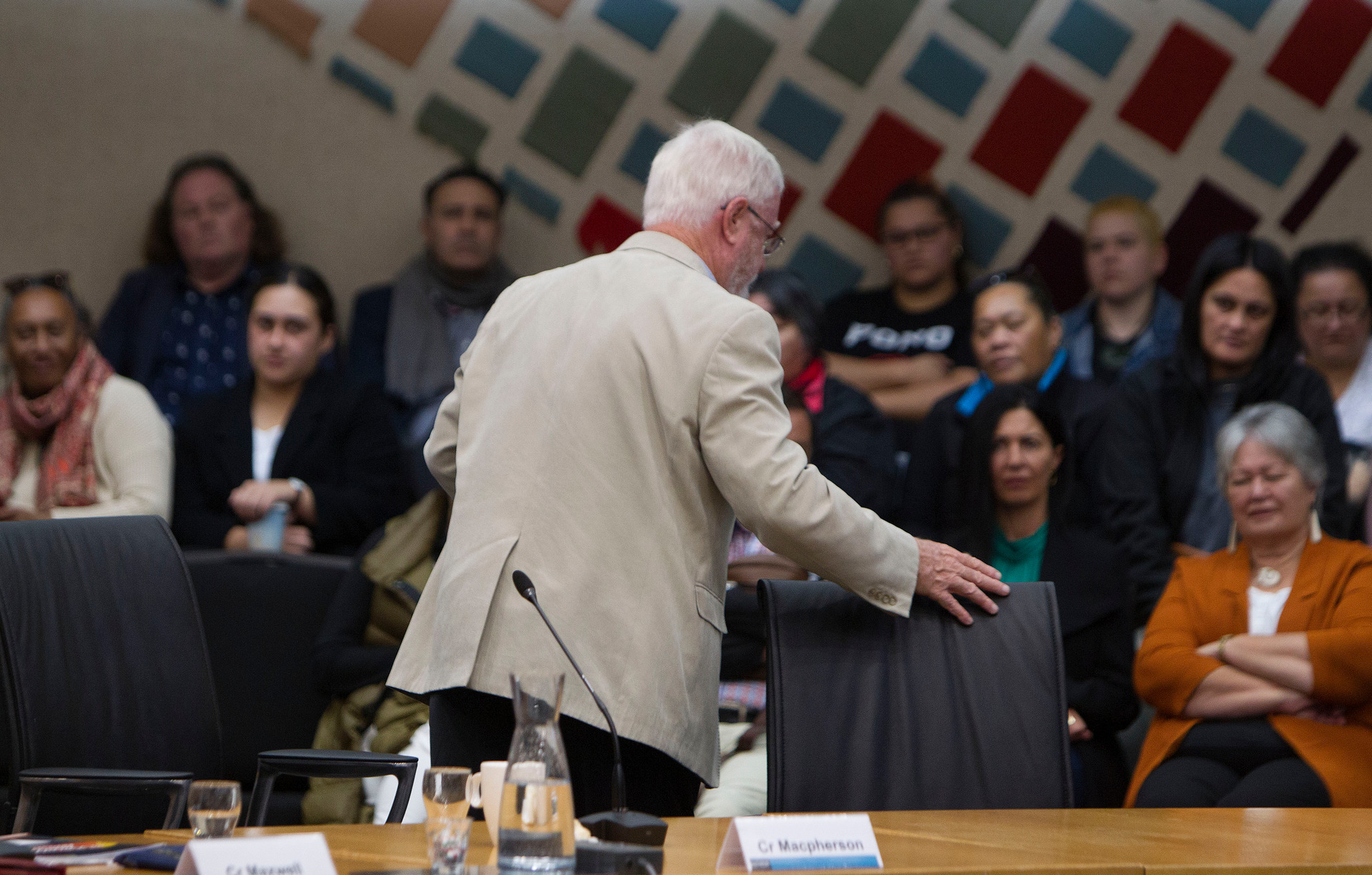 Councillor Reynold Macpherson leaves council chambers during the Māori wards decision meeting on May 21. Photo / File 
