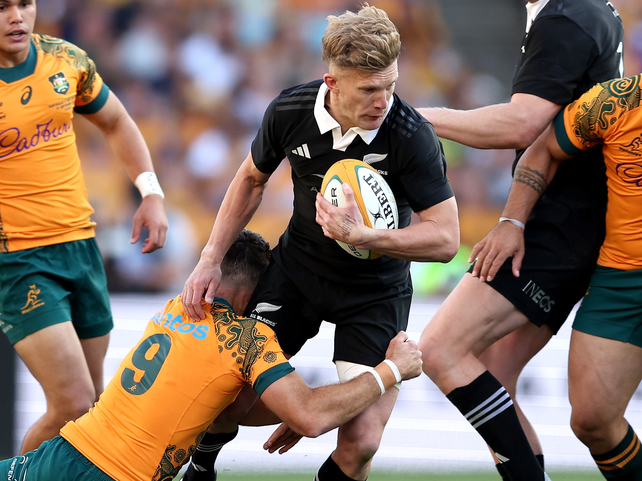 Damian McKenzie tackled against Australia. Photo / Getty Images