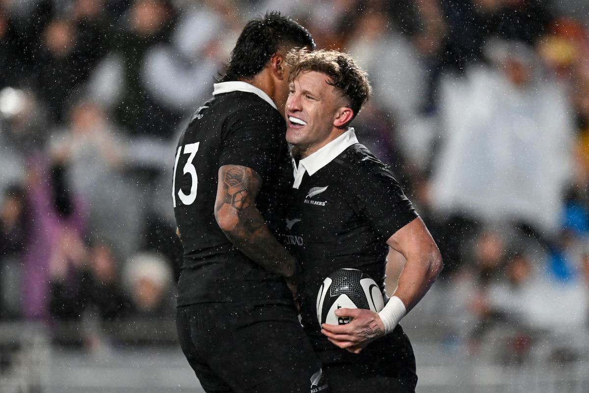 Damian McKenzie of the All Blacks celebrates his try with Rieko Ioane. Photo / Photosport