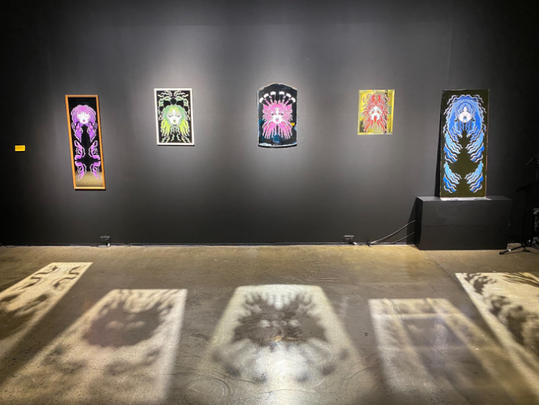 Hair Mask by artist Māia Piata Rose Week casts vibrant shadows on the Tautai Gallery floor.
Photo / Merewai Durutalo