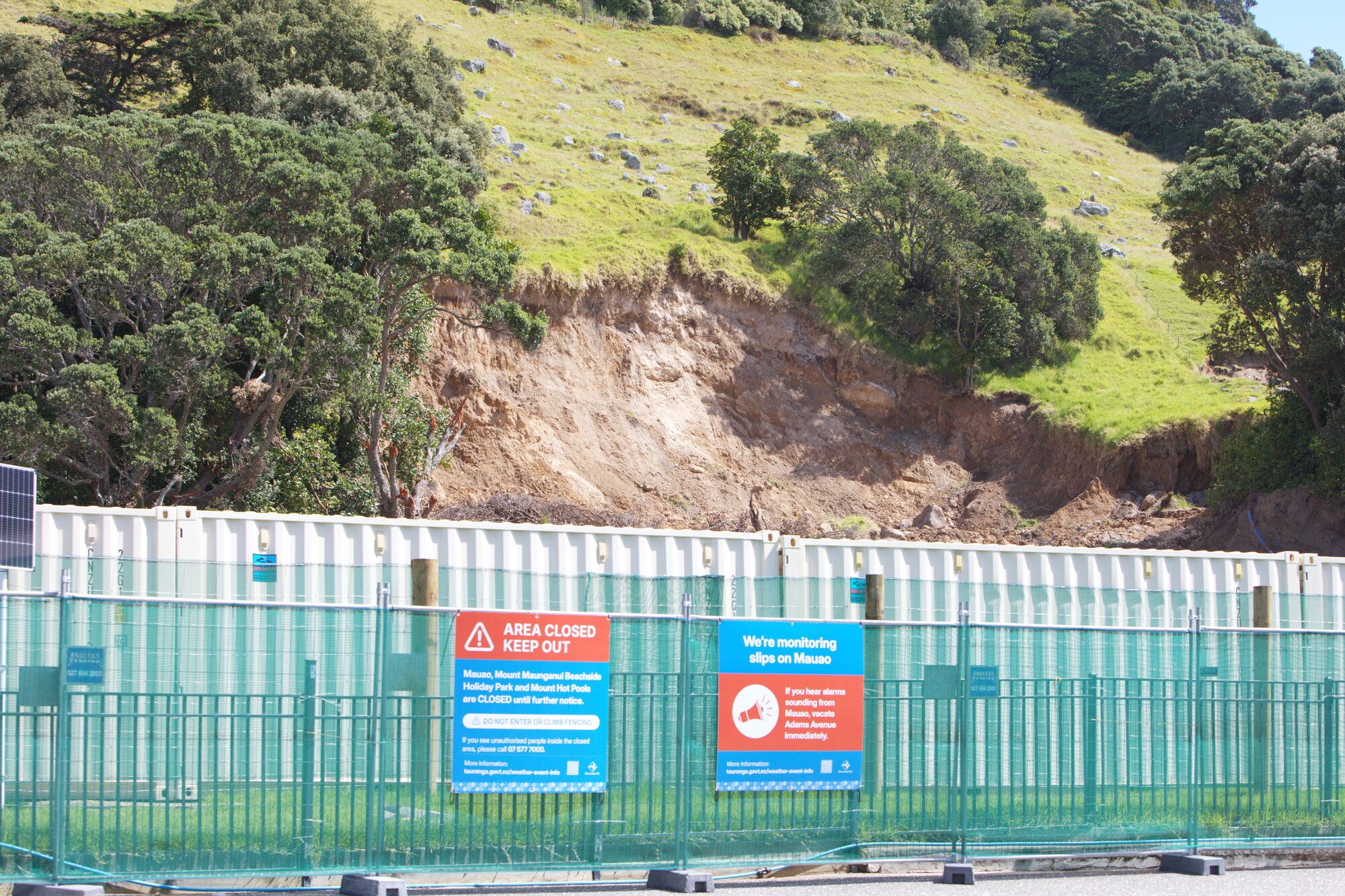 A section carved from Mauao by the January landslide. The area remains closed to the public, with shipping containers placed in case of further slips. Photo / Kelly O'Hara