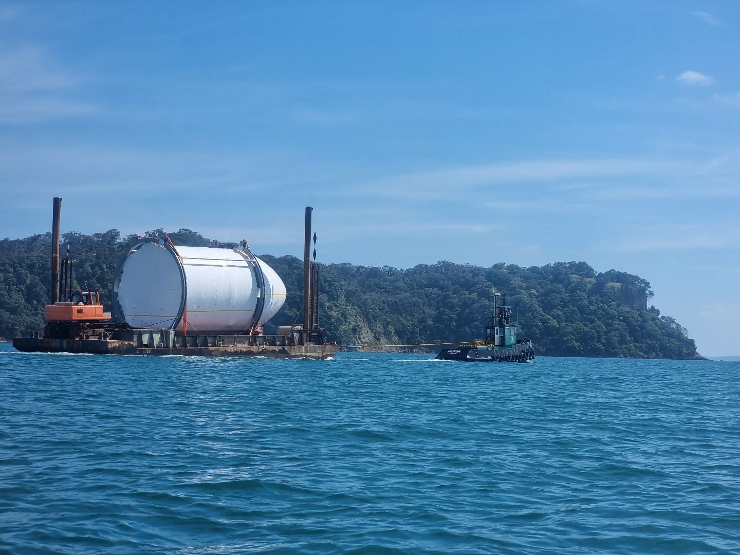 The Neutron nose cone passes kayaker Rob Henson on its way from Warkworth to Northport - where it was loaded to a ship bound for Virginia. Photo / Rob Henson, Facebook