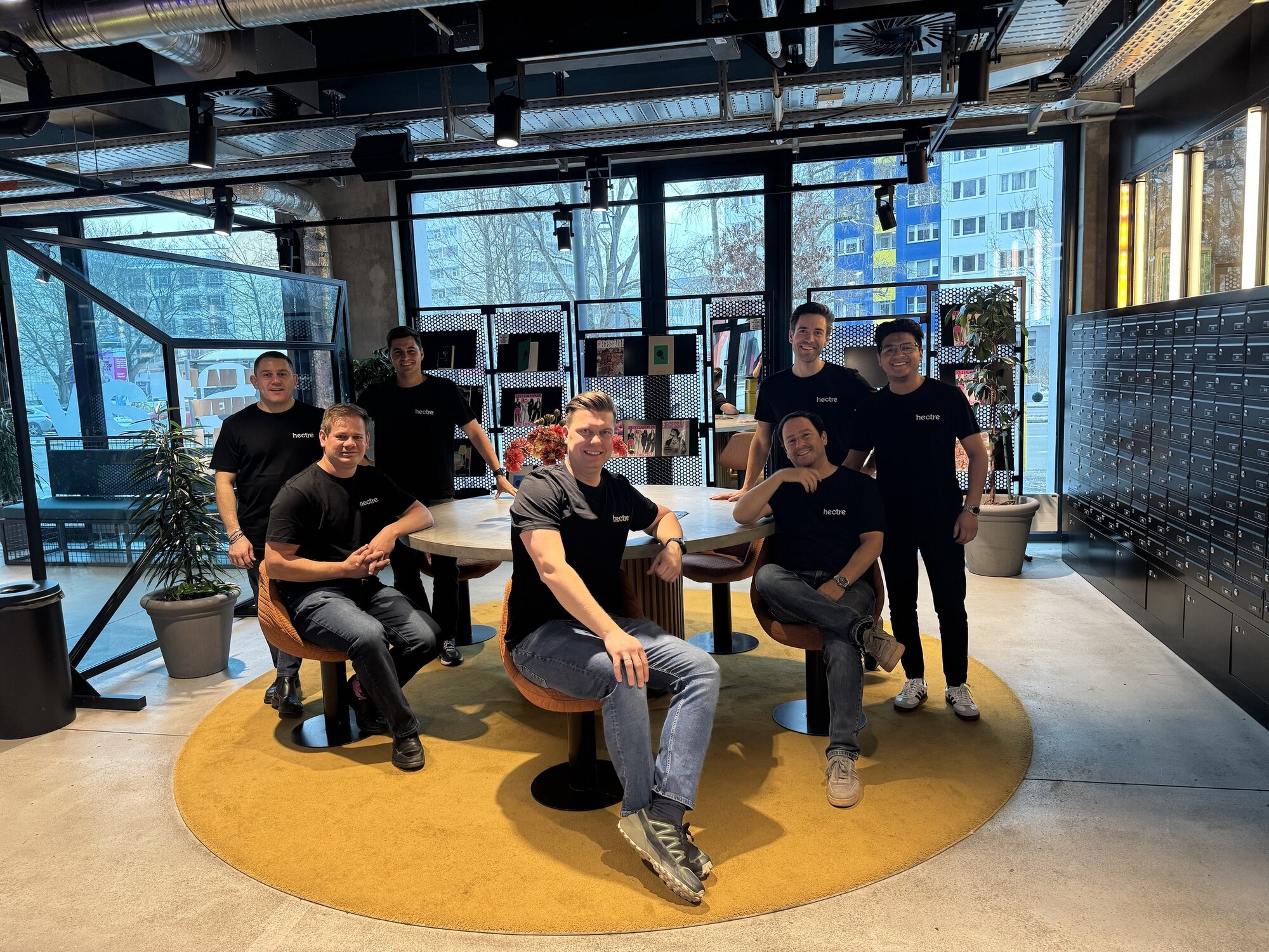 Hectre co-founder and chief executive Matty Blomfield (centre) with his sales team in Berlin for Fruit Logistica 2026.