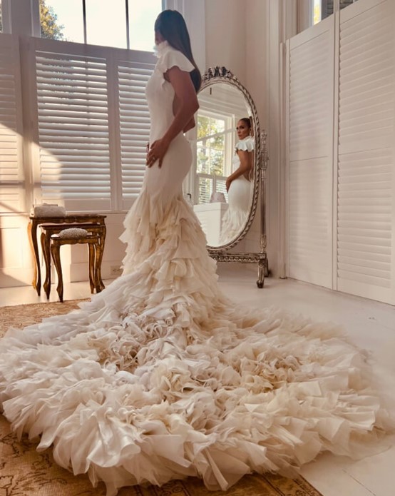 Jennifer Lopez wore a capsule of Ralph Lauren dresses. Photo / On The JLo