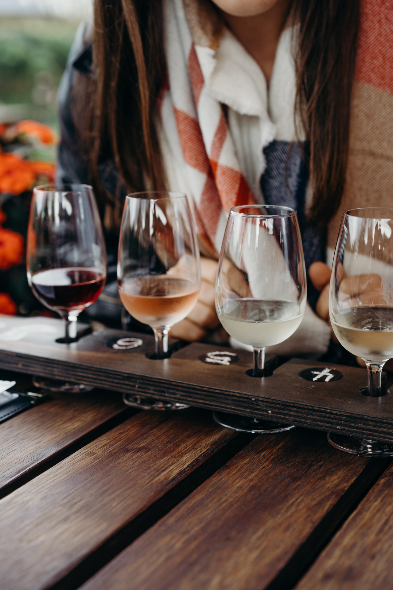 A flight of wine is the way to go when trying to decide on what to order at River-T Wines. Photo / Sarah Pollok