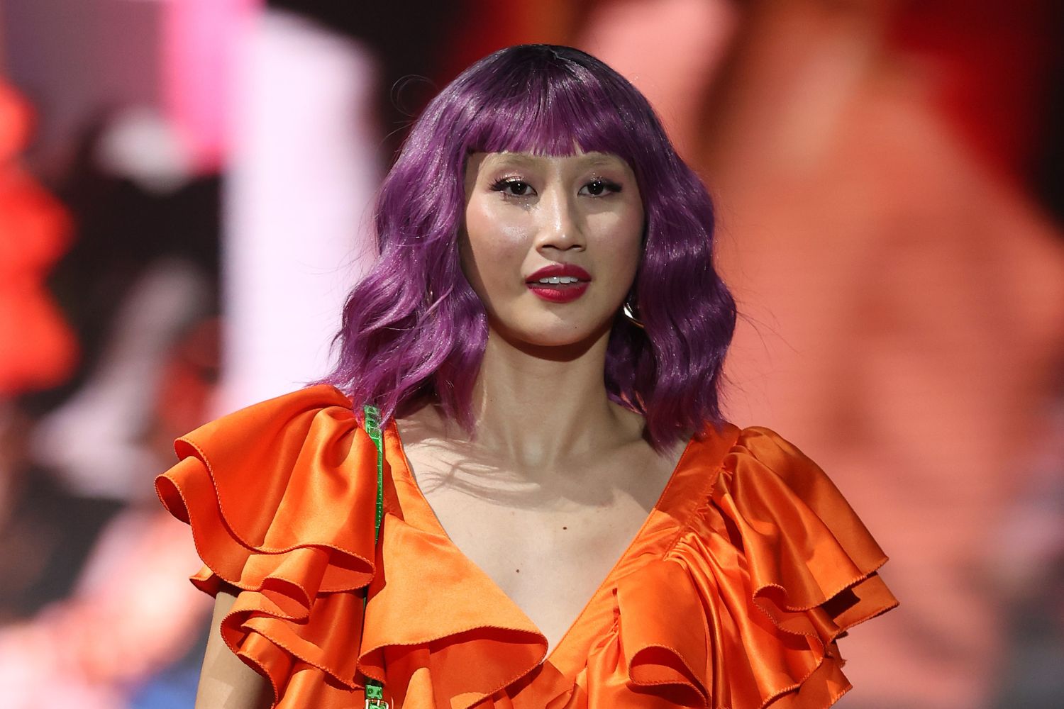 A model dons a poppy pink wig, styled by Danny Pato, at Kathryn Wilson. Photo / Getty Images