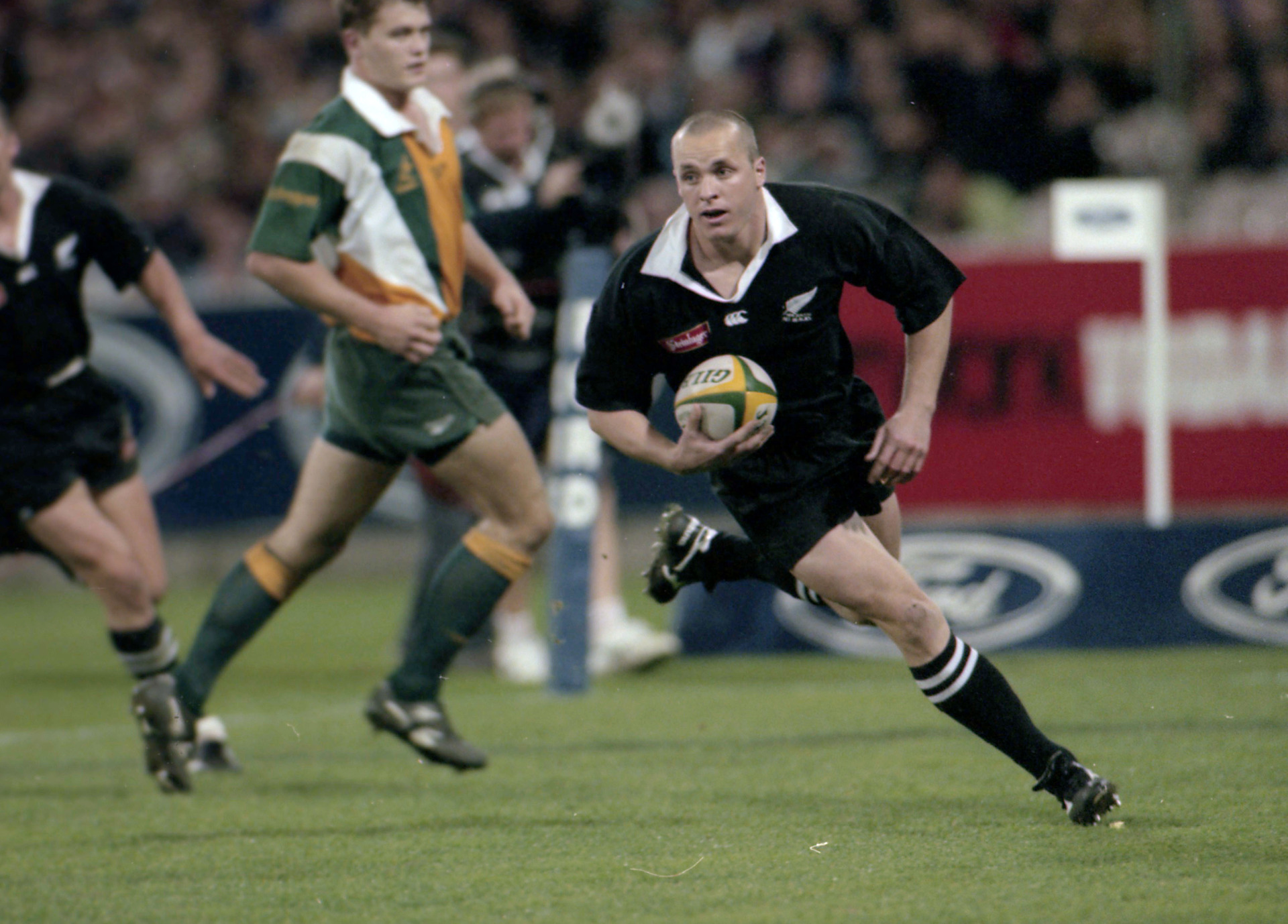 Christian Cullen cruises in for a try during a 1997 test against the  Wallabies in Dunedin. Photo / NZ Herald