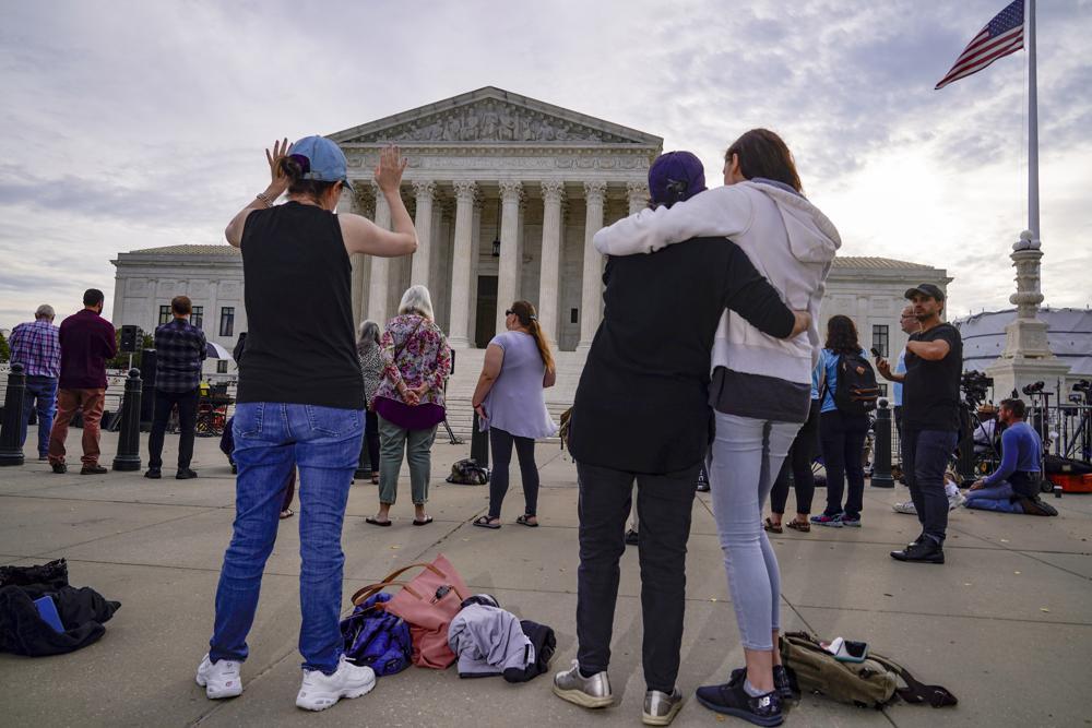 The Supreme Court is seen on the first day of the new term as activists opposed to abortion demonstrate on the plaza, in Washington. Photo / AP