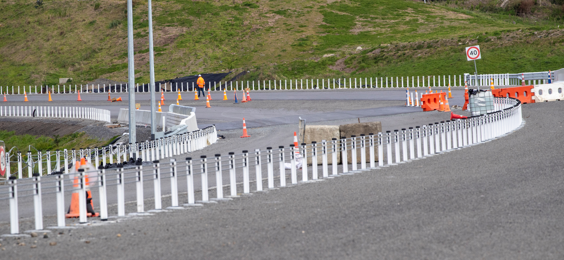 A lone worker inspecting a section of Transmission Gully during lockdown. Photo / Mark Mitchell 