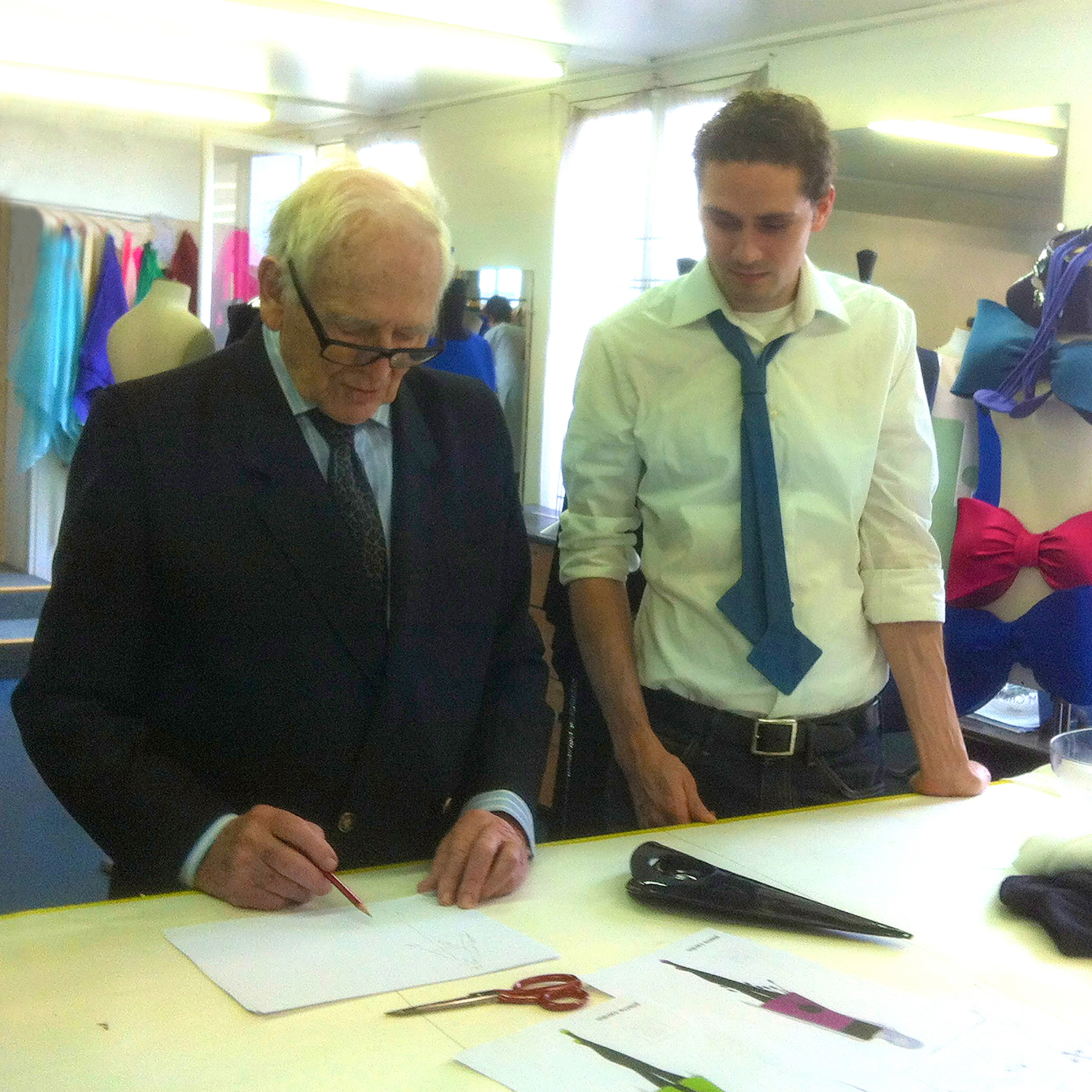 In an image provided to the New York Times by Richard Raczynski, Pierre Cardin and his great-nephew Louis Cardin-Edwards in the Cardin studio in Paris in 2013.