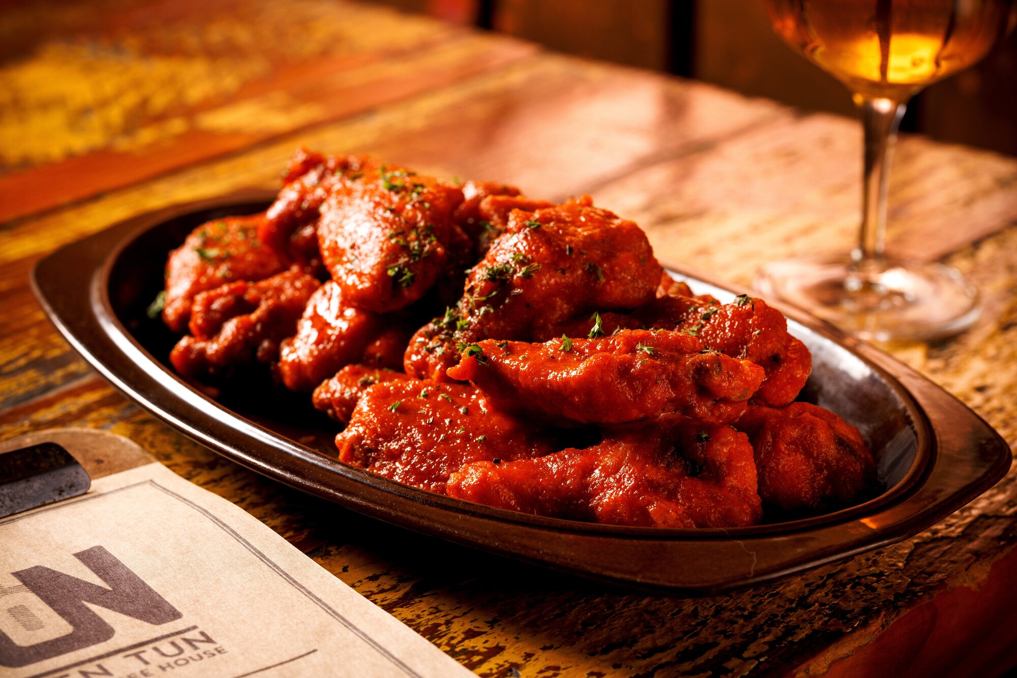 Buffalo chicken wings from 16 Tun - one of the dishes that made the 2026 Iconic Auckland Eats Top 100. Photo / Babiche Martens