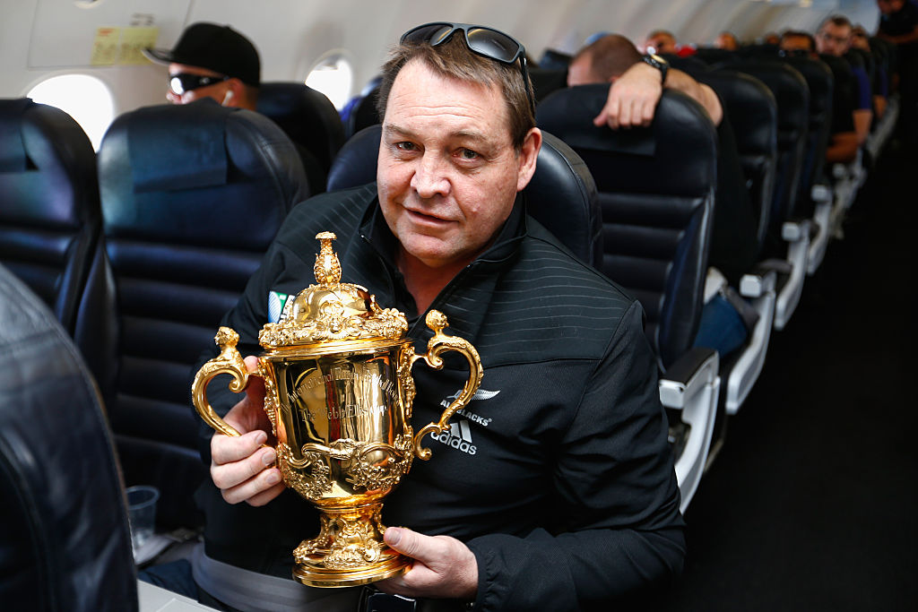 Steve Hansen poses with the Webb Ellis Cup enroute to Christchurch for the New Zealand All Blacks welcome home celebrations. Photo / Getty Images