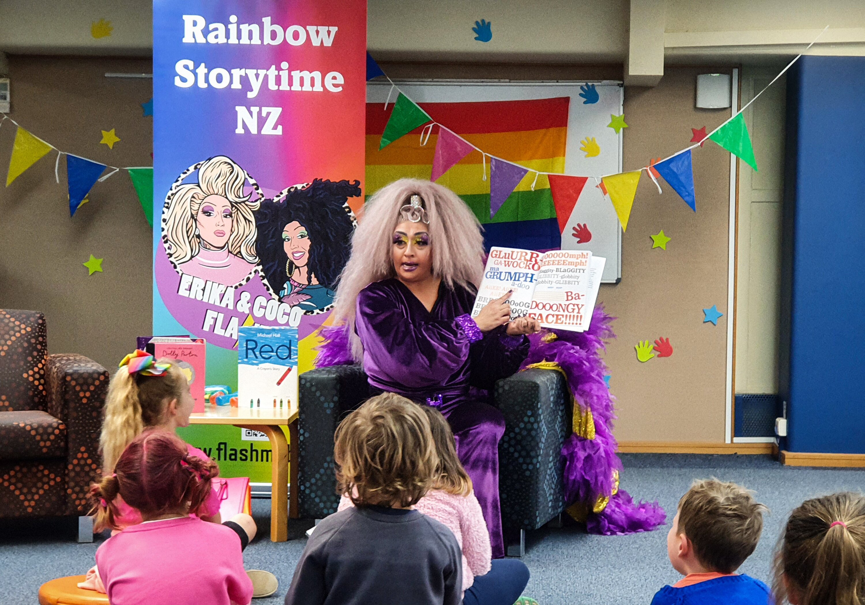 Sunita Torrance as Coco reading to children during the Rainbow Storytime NZ in Hastings May 2022. Photo / Wendy Schollum