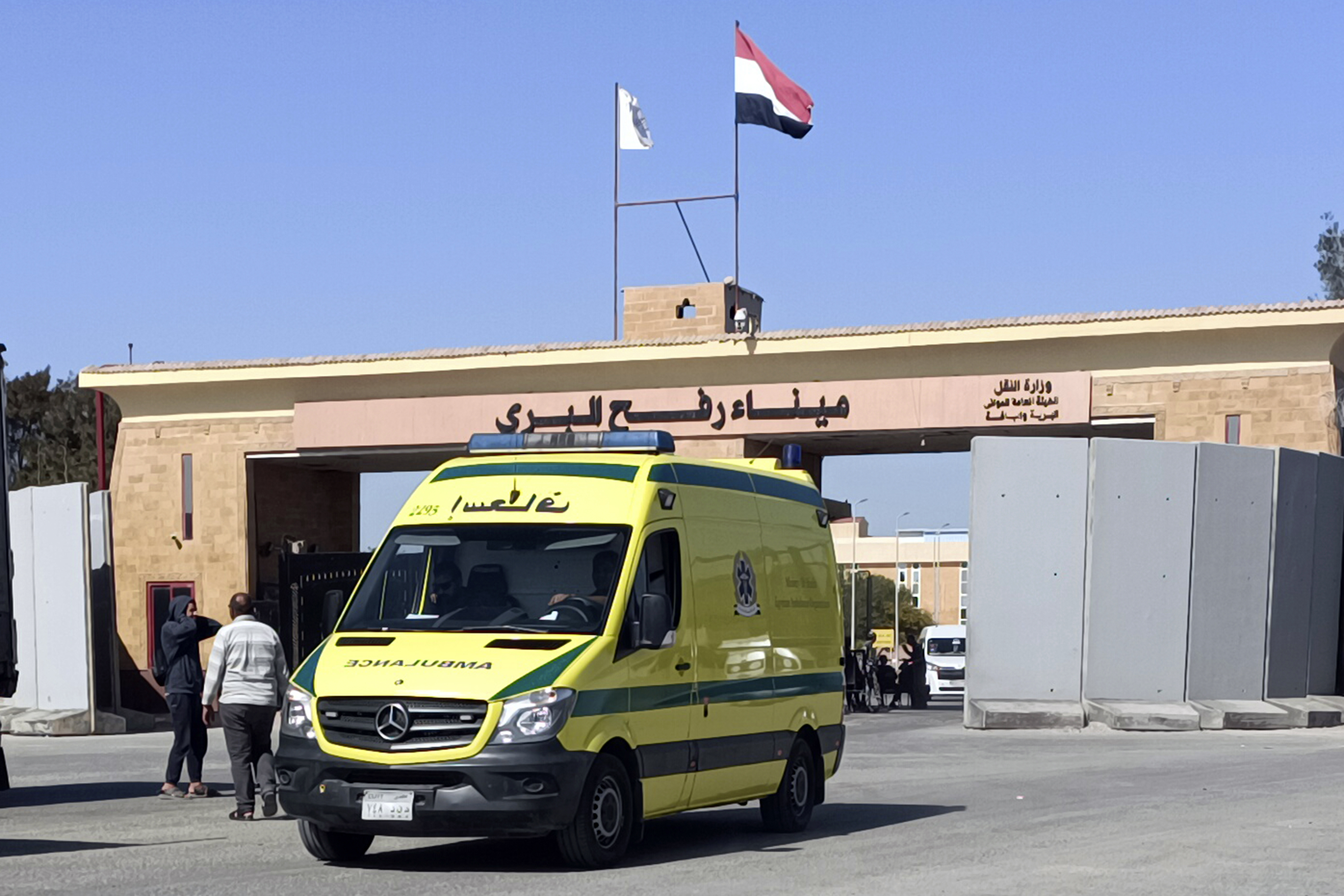 An ambulance carrying bodies of the foreign humanitarian aid workers killed in a recent Israeli airstrike in Gaza crosses the Rafah border crossing between Egypt and the Gaza Strip. Photo / AP