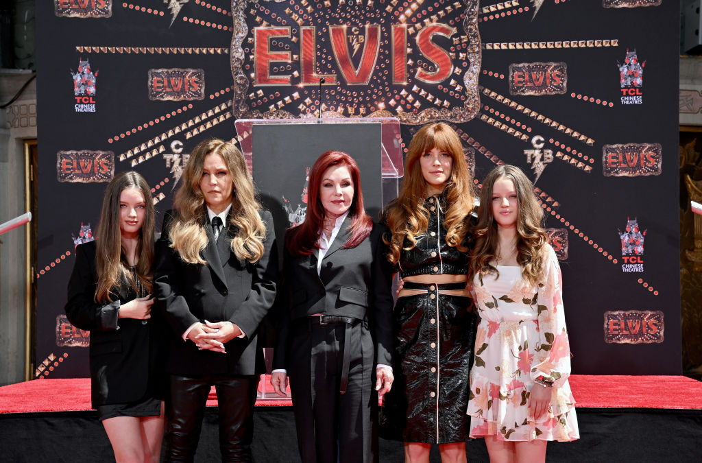 Lisa Marie Presley with her mother, Priscilla Presley, centre and daughters, Harper Vivienne Ann Lockwood, left, Riley Keough, second from right, and Harper's twin Finley Aaron Love Lockwood, far right. Photo / Getty Images