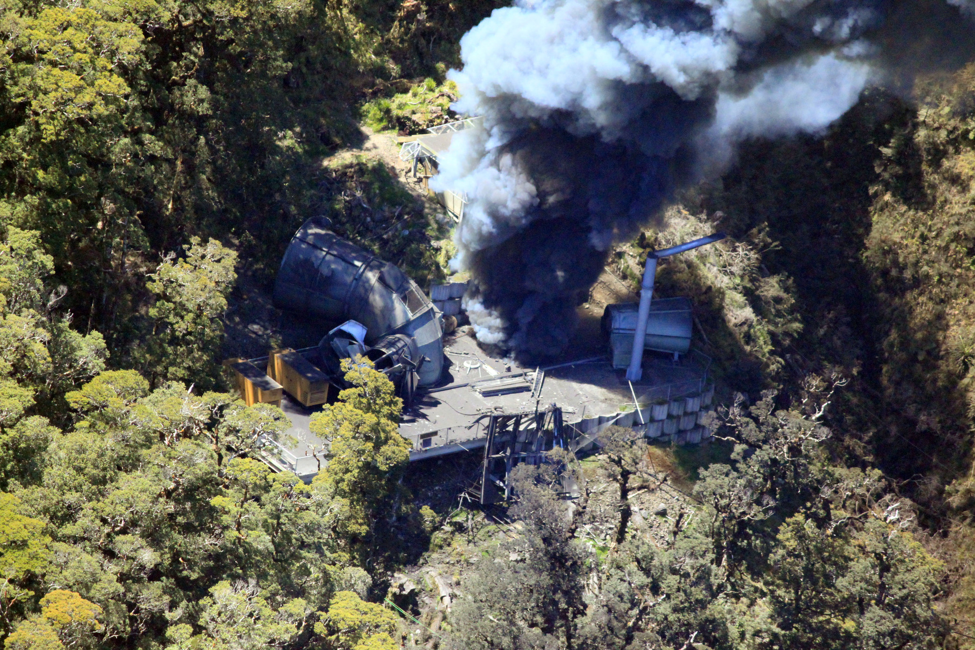 Smoke billows from the ventilation shaft after the fourth explosion in the Pike River coal mine where 29 miners and contractors are still fatally trapped to this day. Photo / File