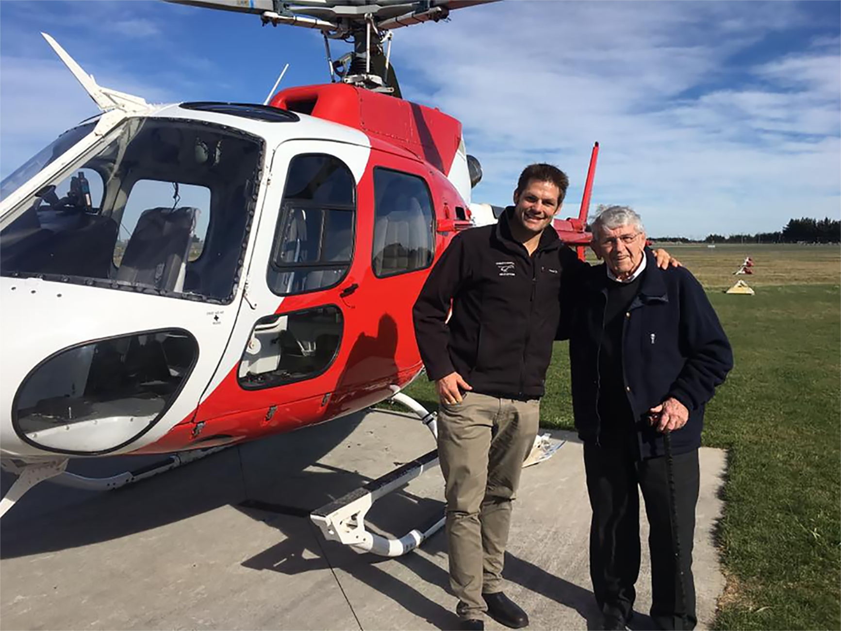 Former All Black captain Ritchie McCaw and former All Black Bill McCaw after Bill was taken for a helicopter ride on his 90th birthday. Photo / Peter Maynard.